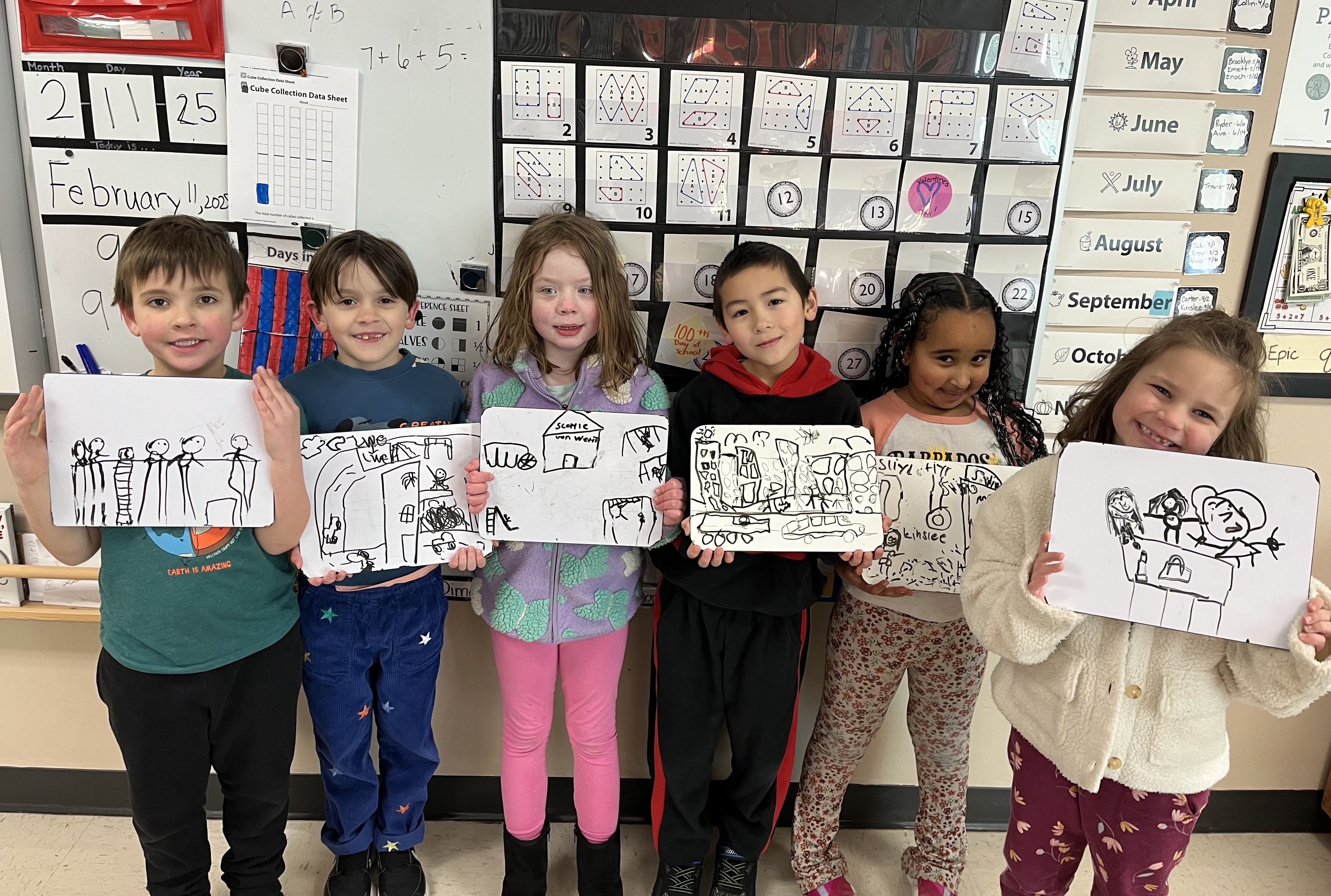 students with drawings of ideal communties