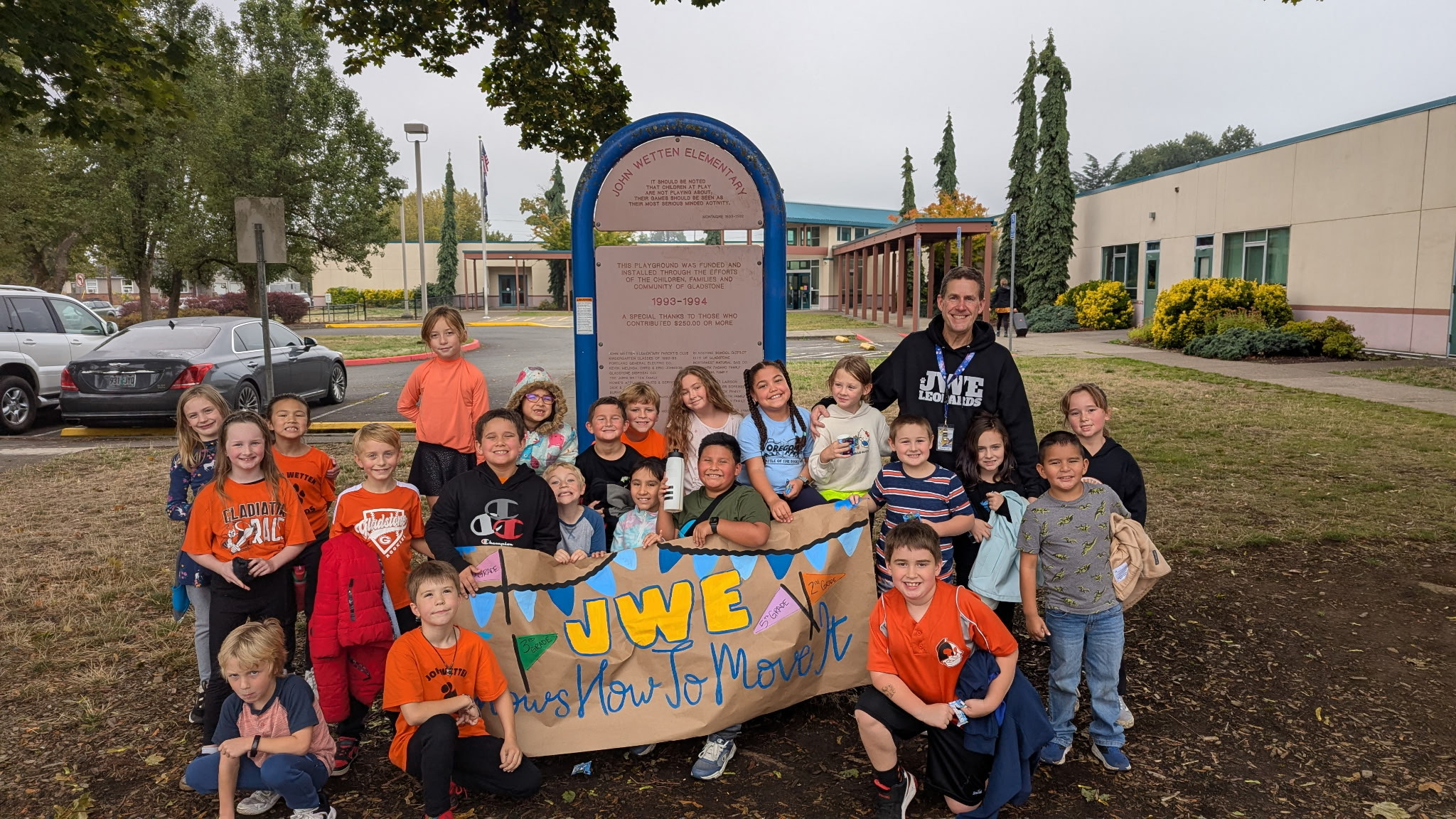 class in front of sign