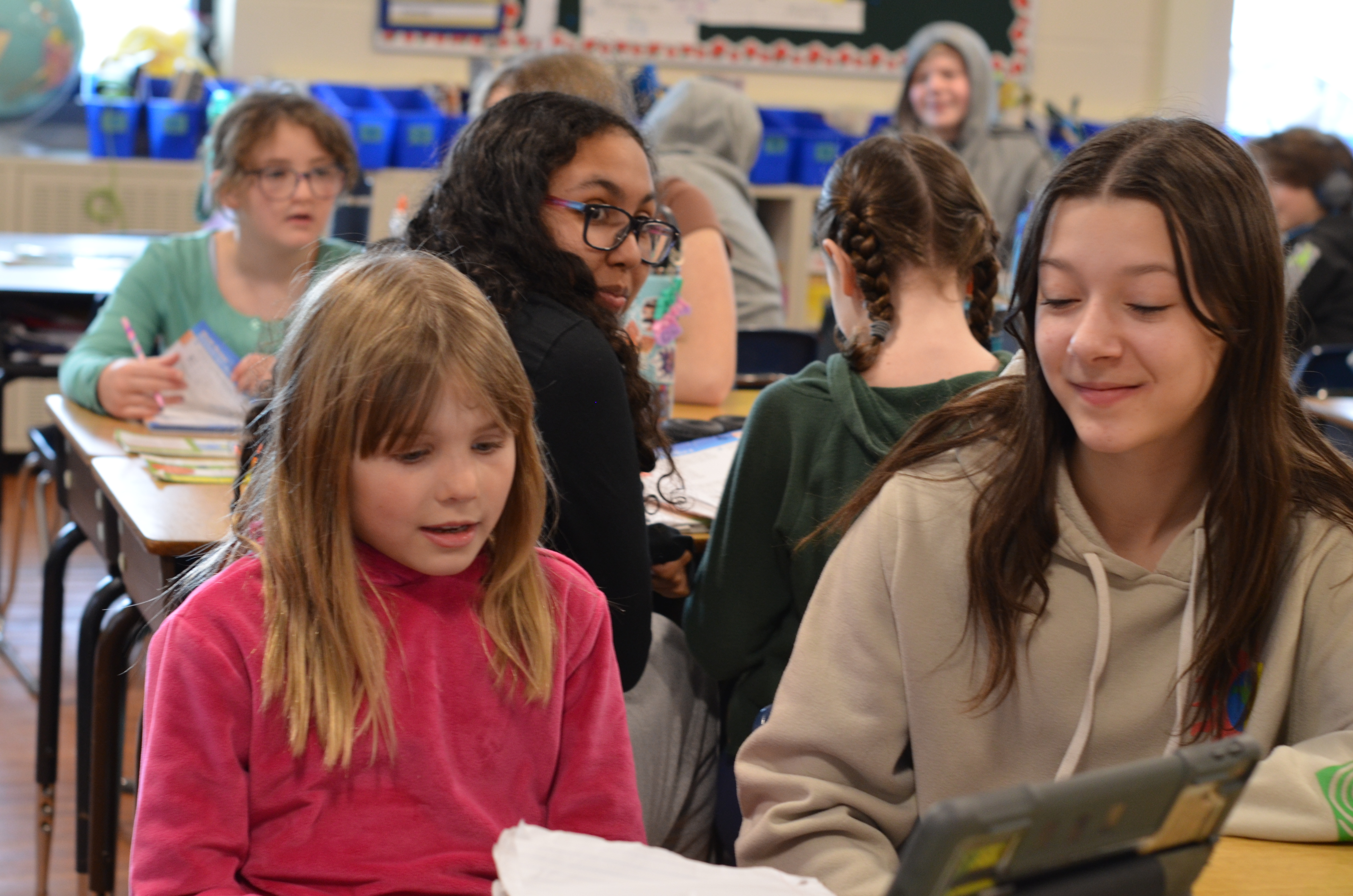 Students working on homework in classroom