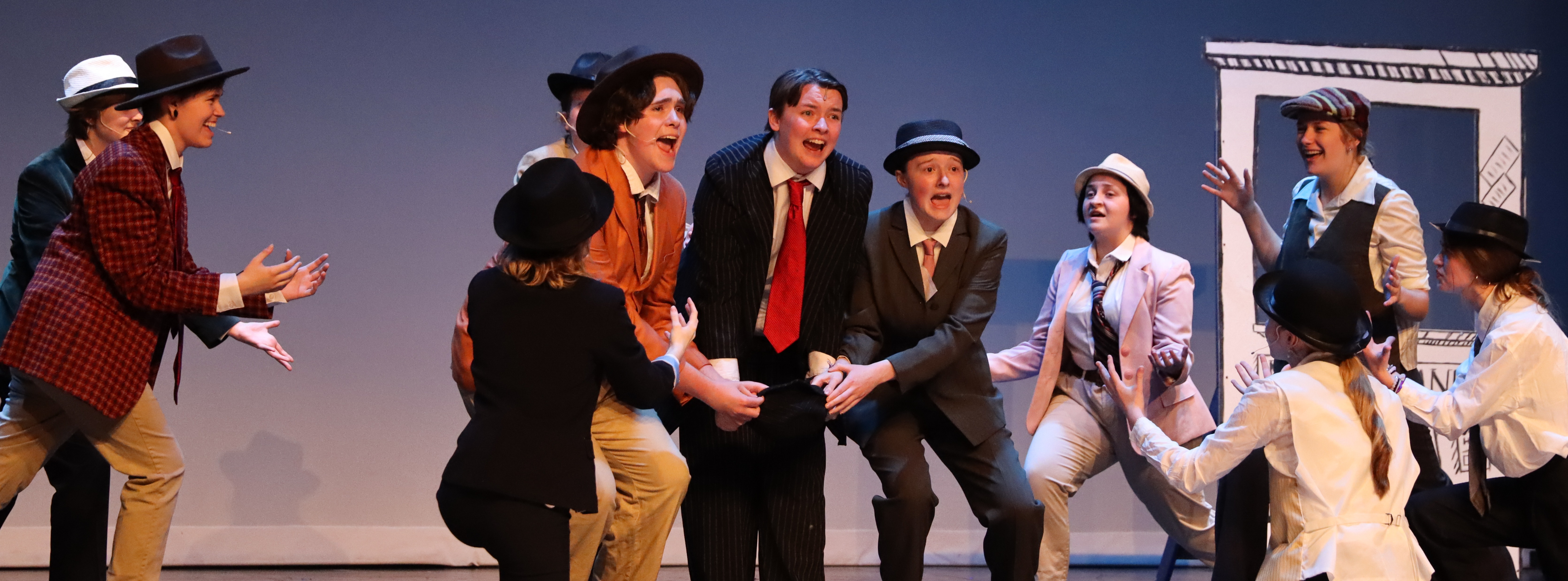 Students performing in Guys & Dolls