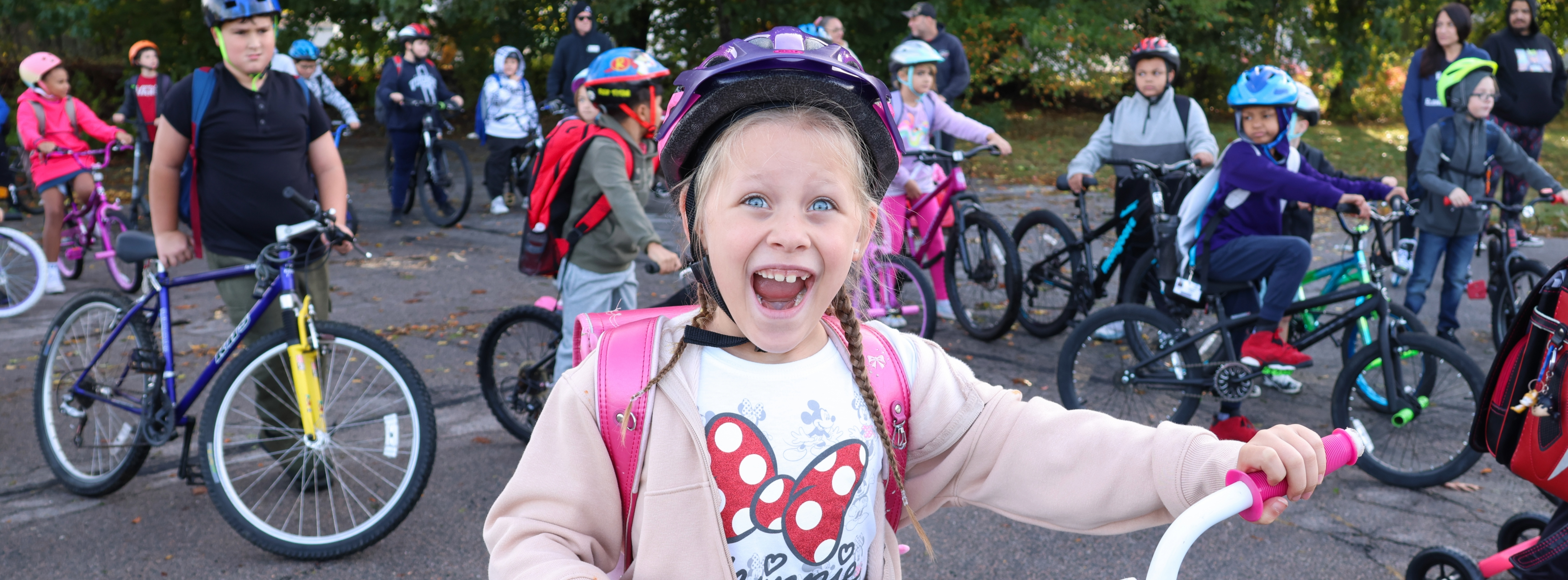 Student on a bicycle.