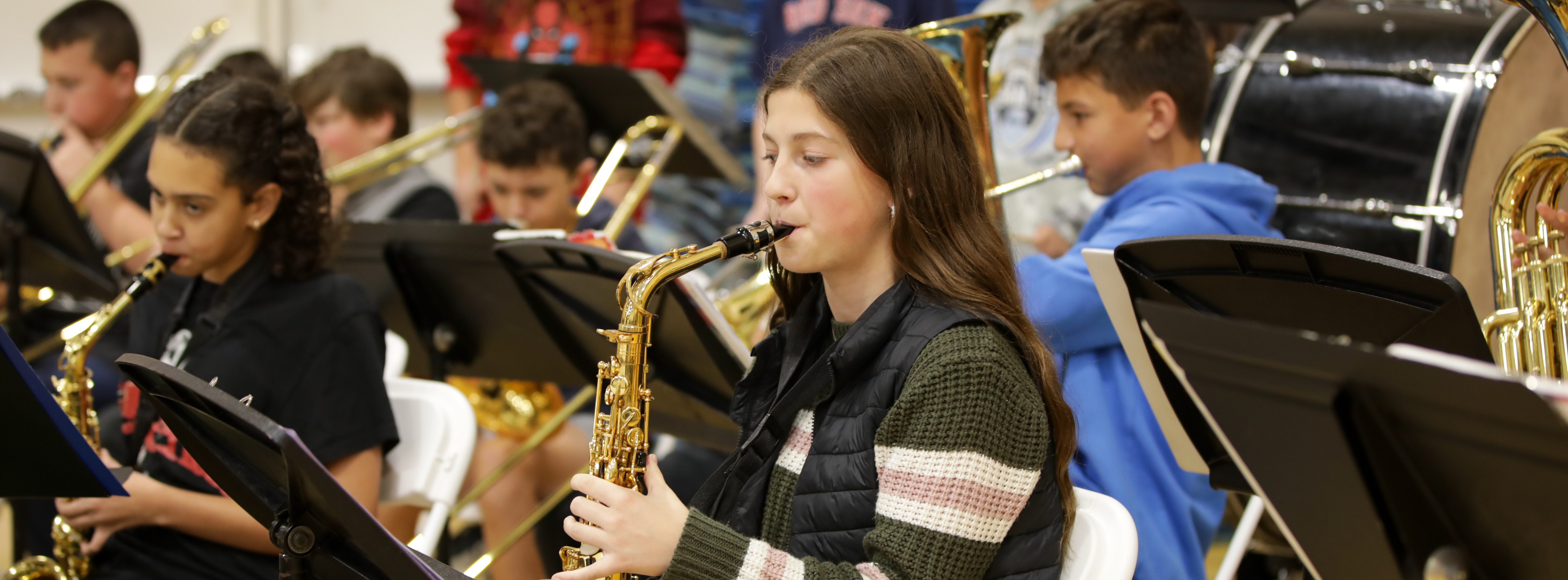 Students playing instruments.