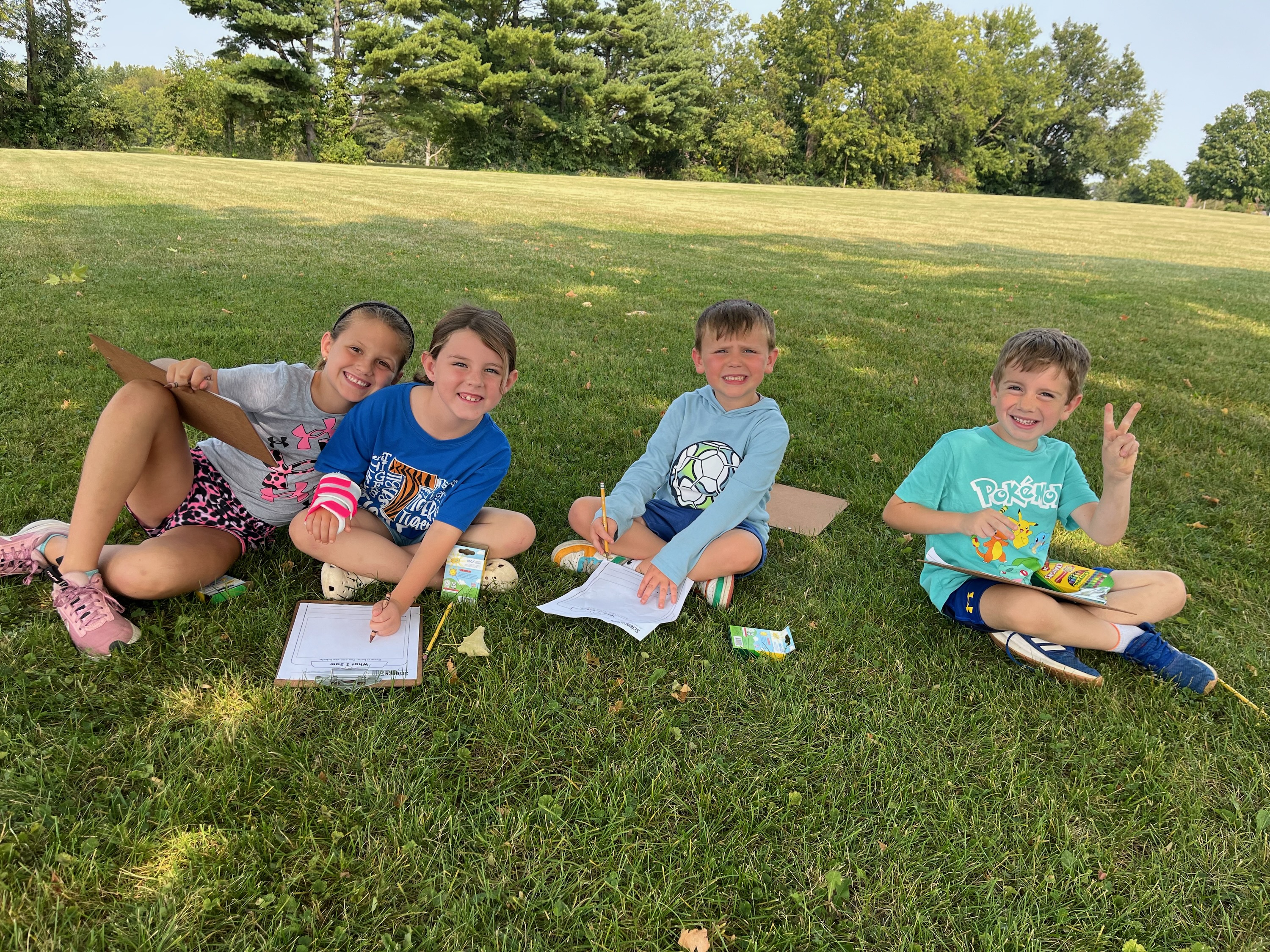 Students sitting on the grass