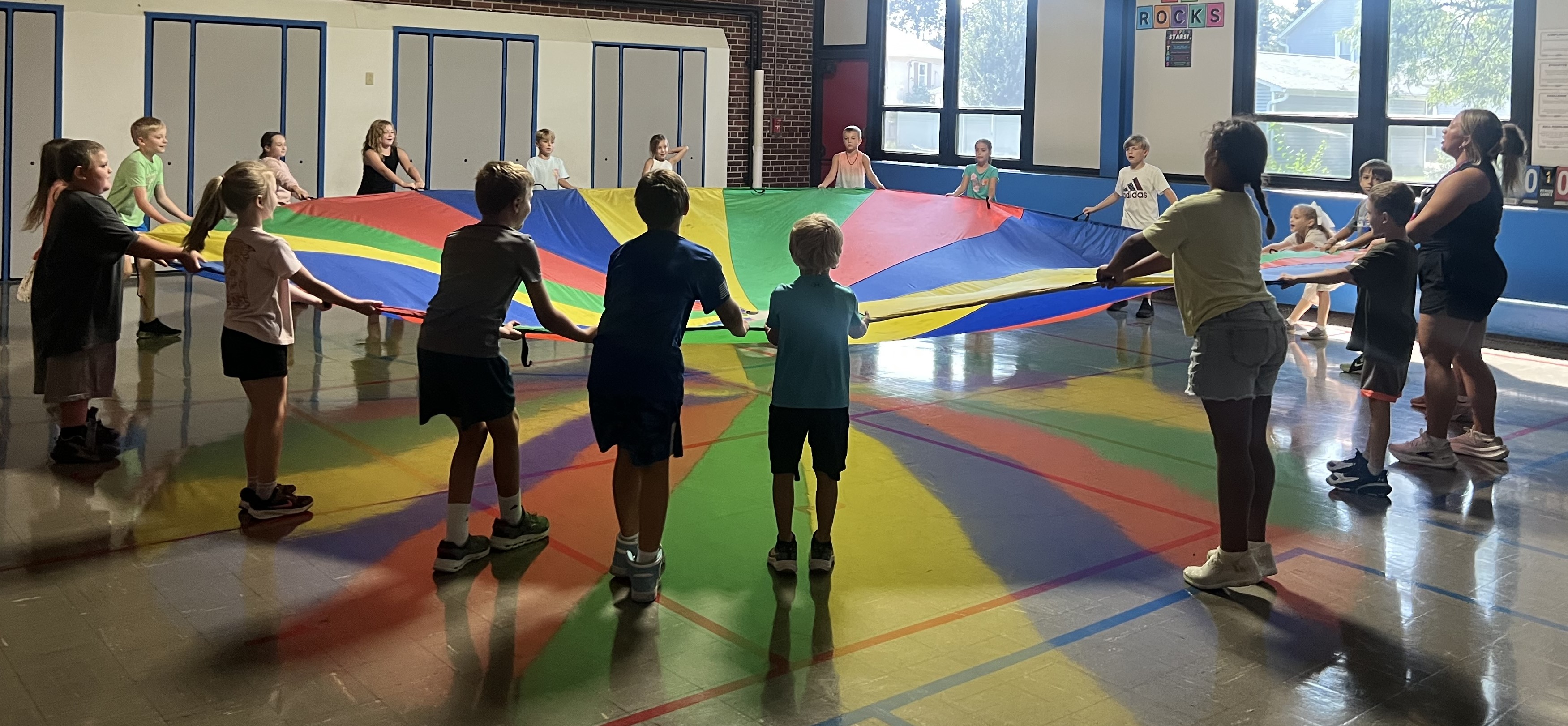 Lioncoln Students with parachute in Mrs. Turczyn's PE Class