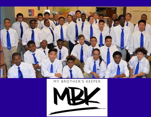 Picture of a group of men with "My Brother's Keeper MBK" written underneath