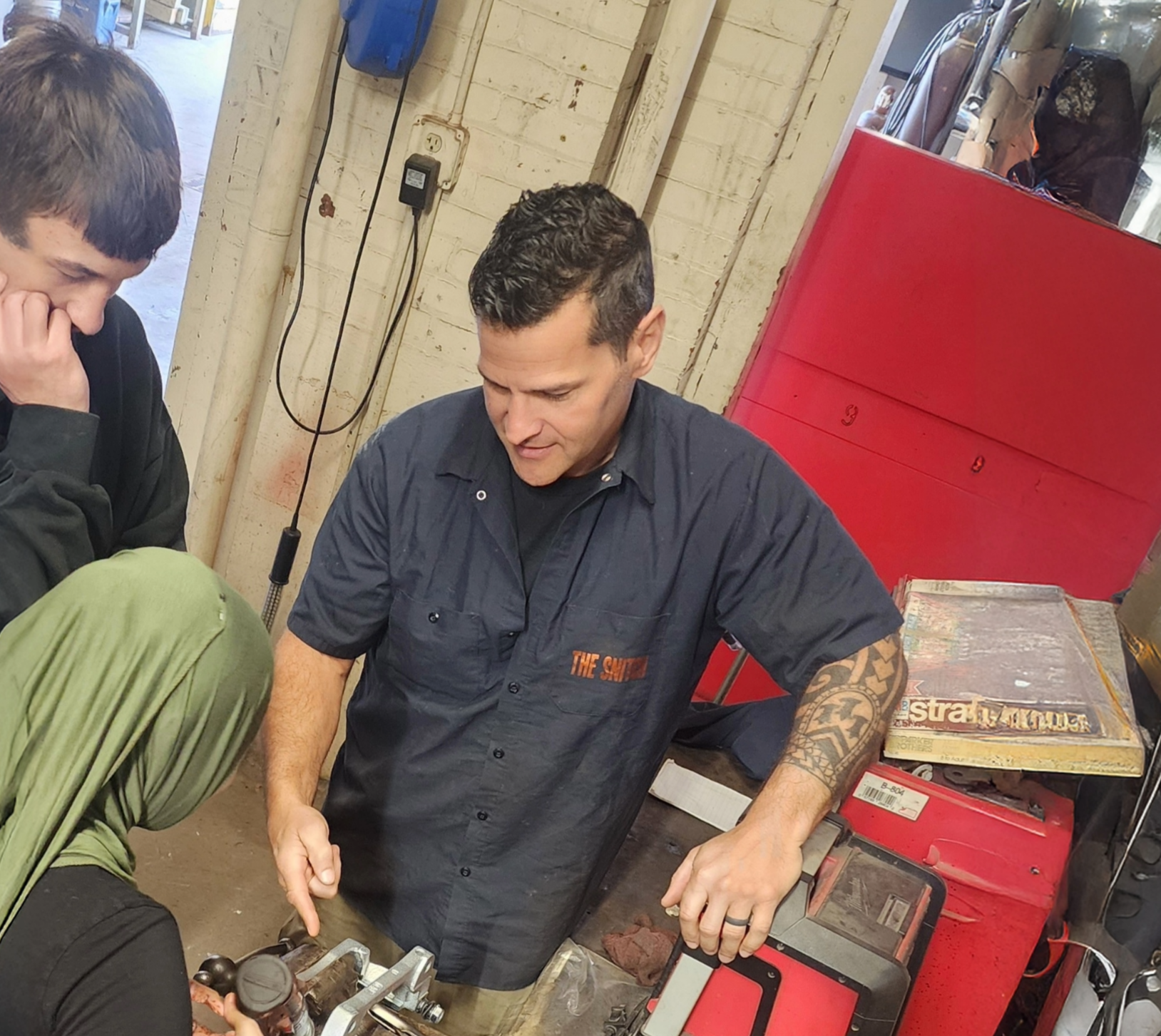 Tim Camp working with students