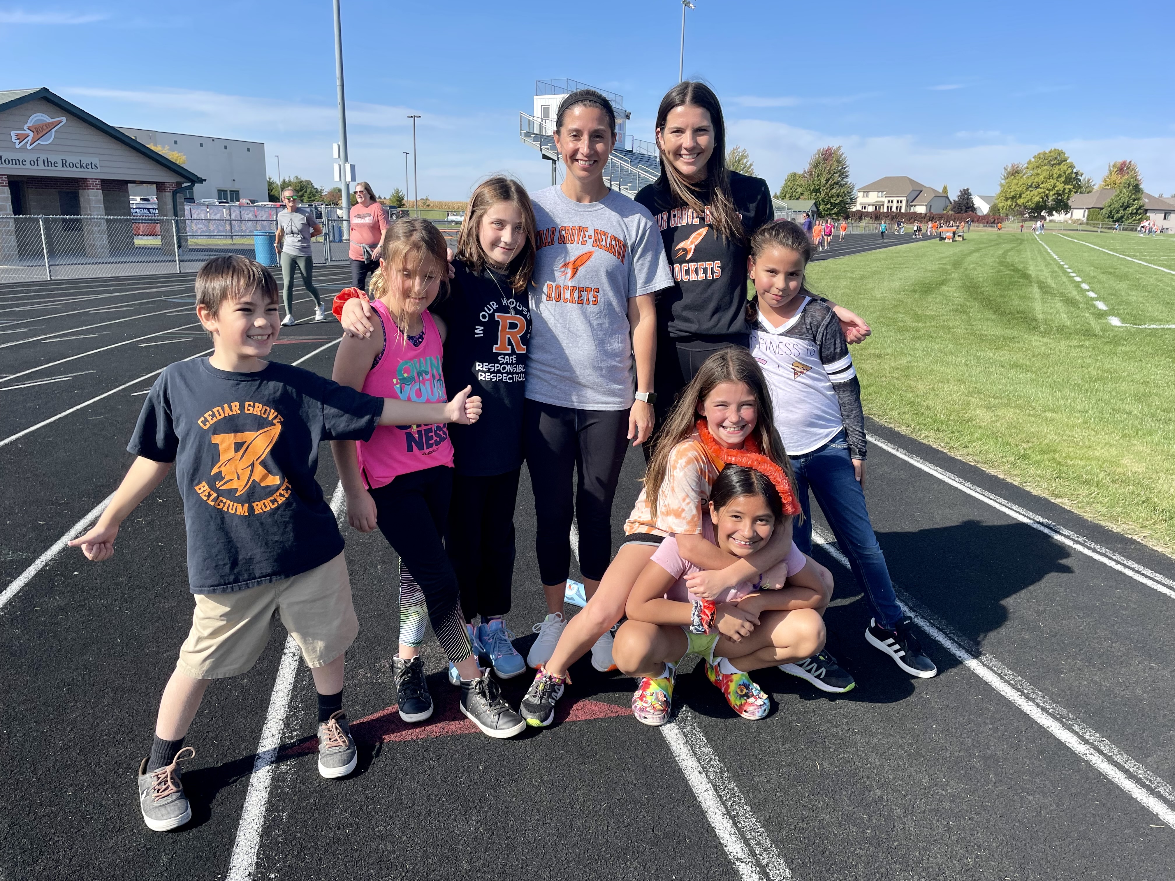 4th Grade Celebrating Field Day on the football Field 