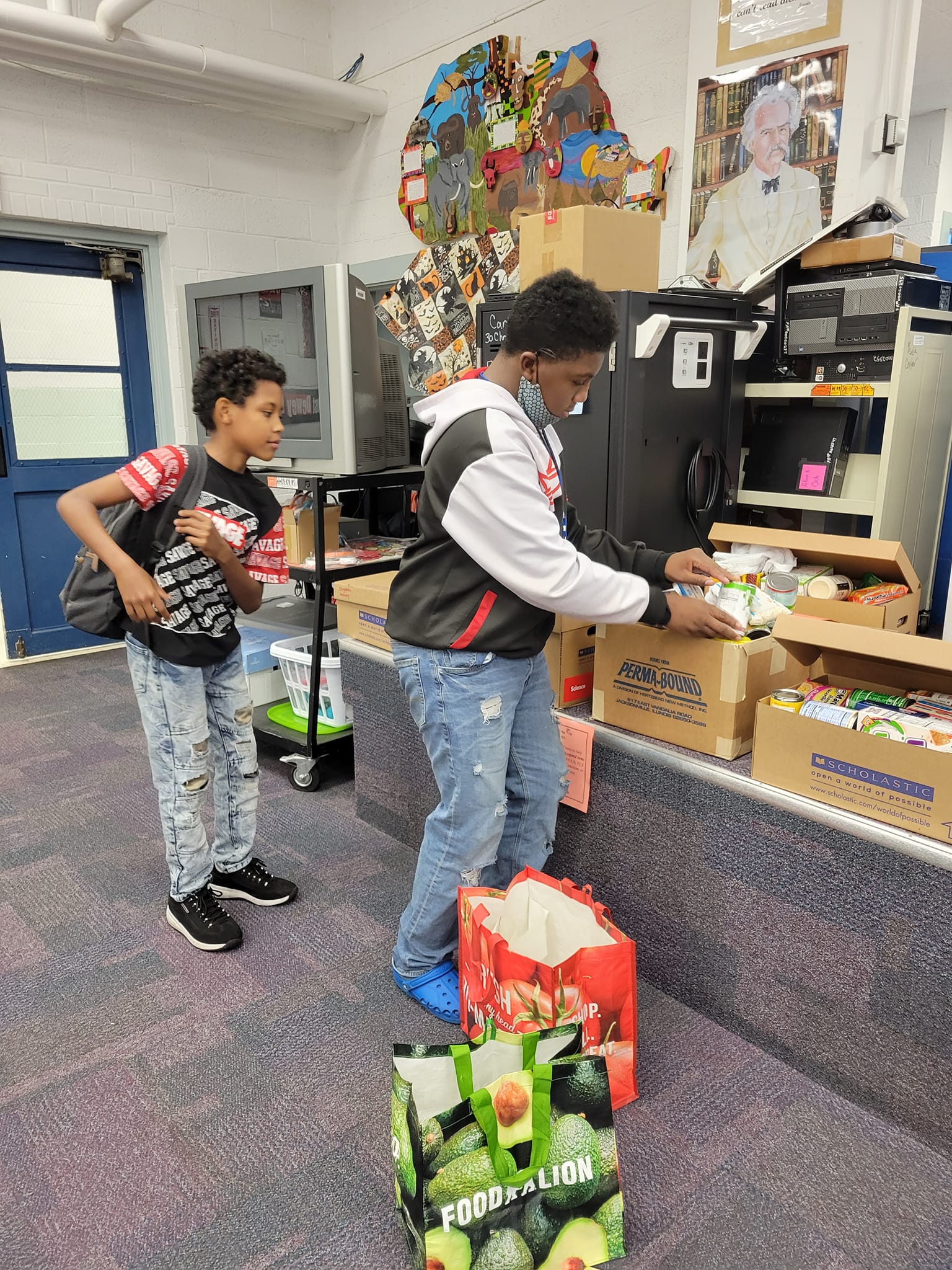 students bagging up food
