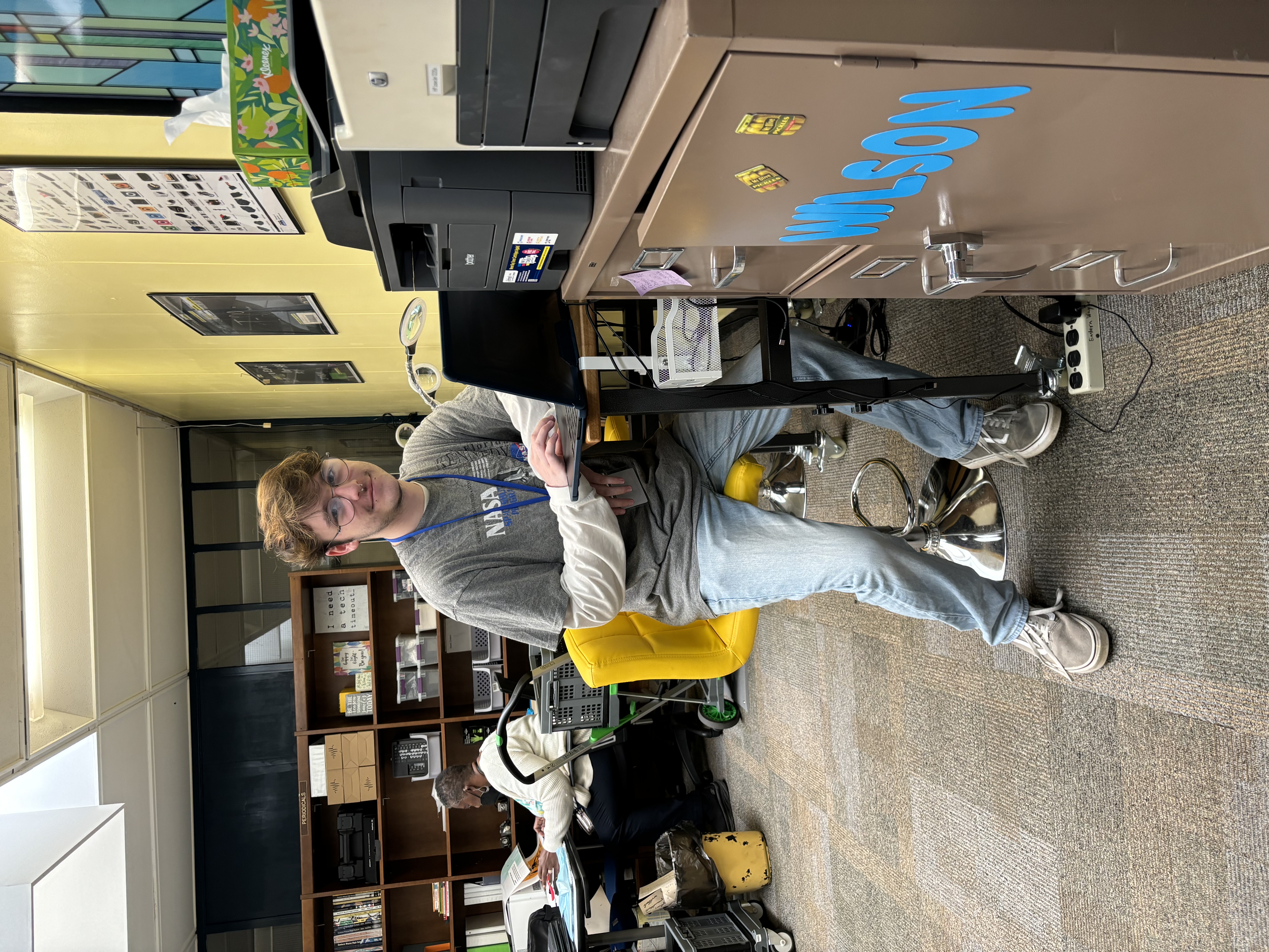 Student making a Chromebook repair