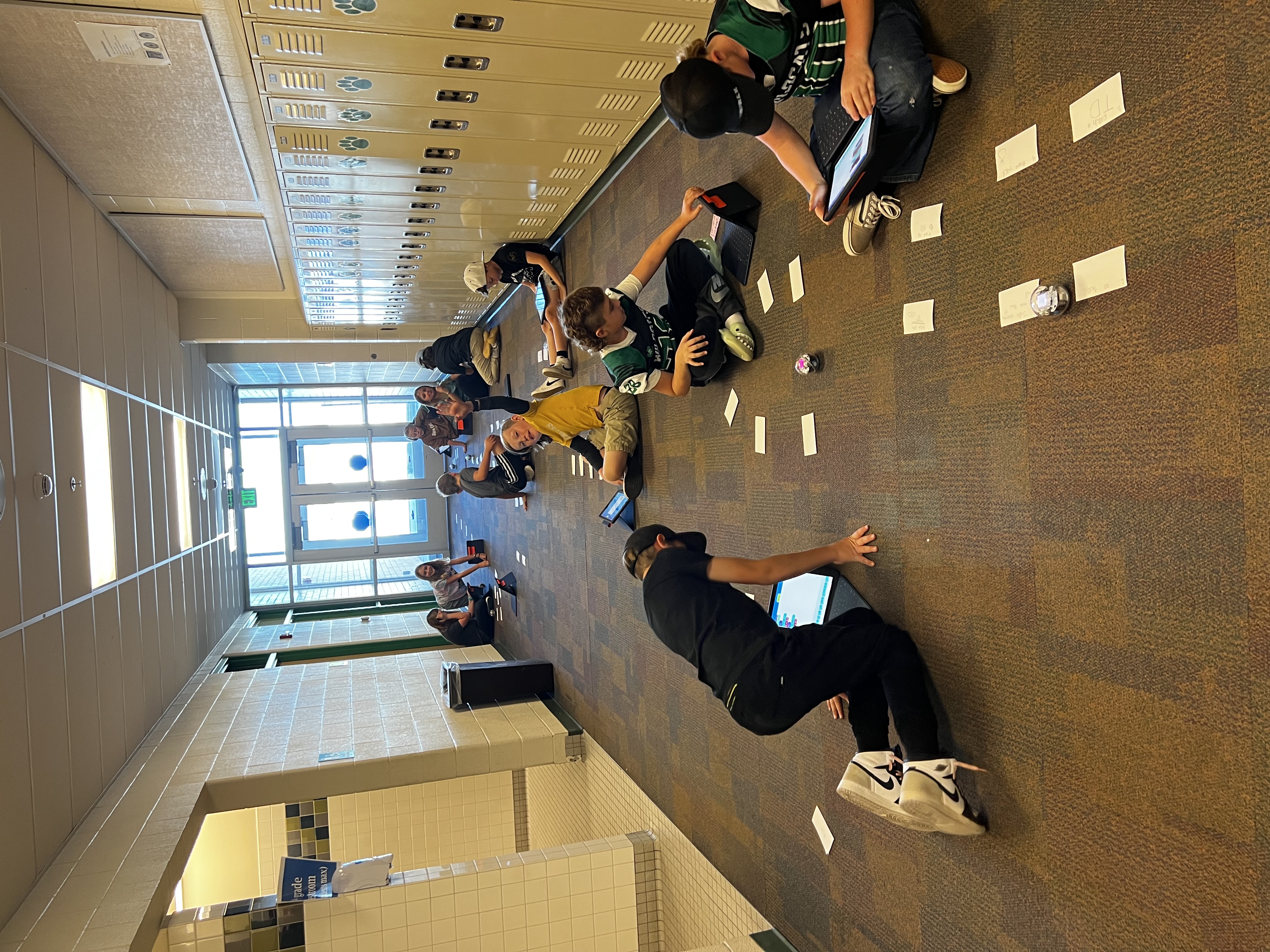 Students using robots in South Summit Middle School.