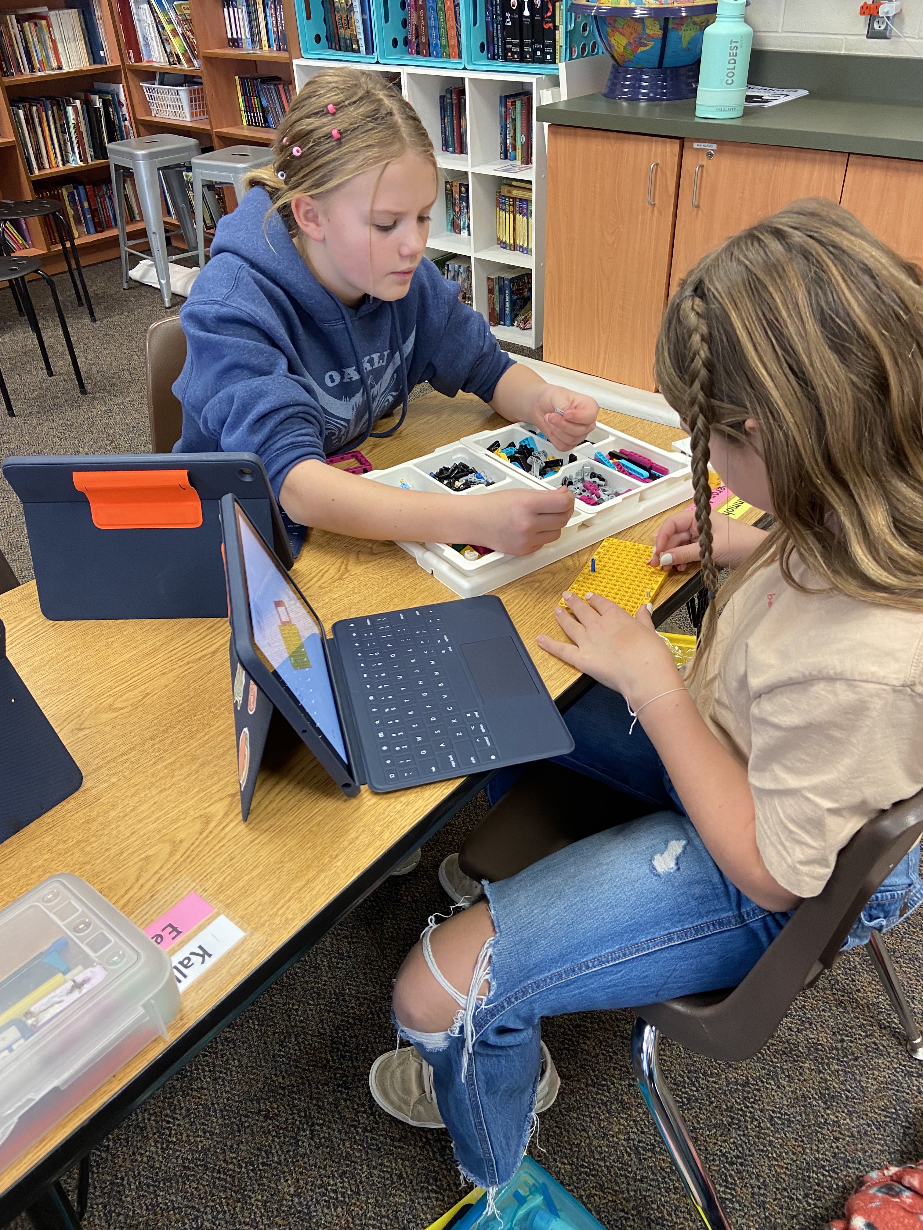 Student making Lego Hopper