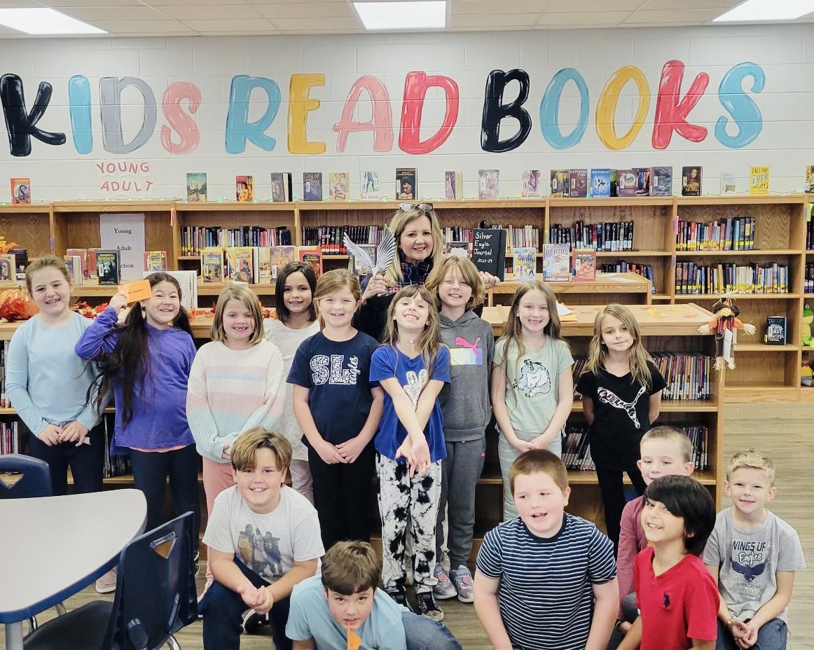 Mrs. Hilary awarded the Silver Eagle by Mrs. Riggins' class.