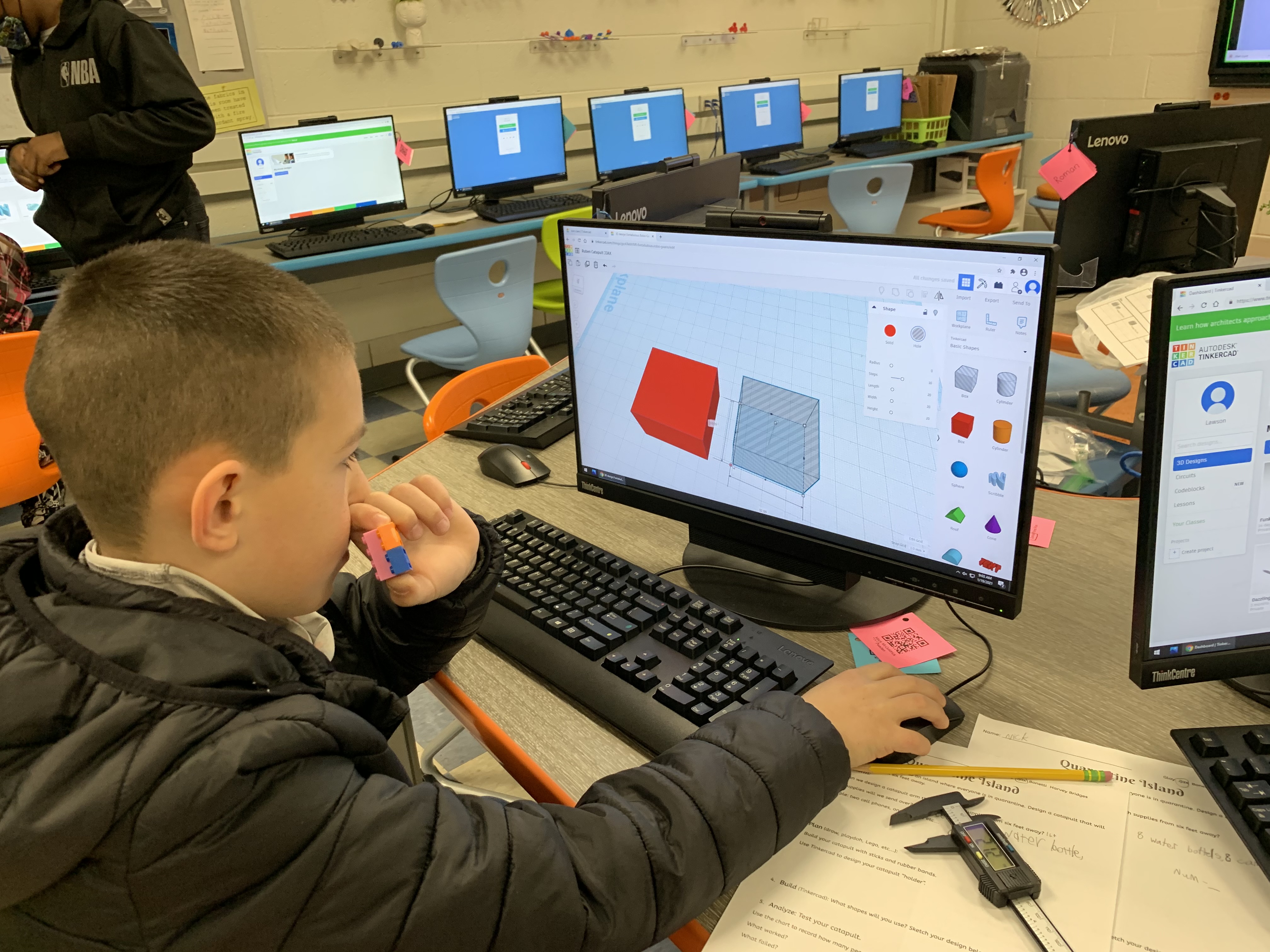 boy using 3-D print software
