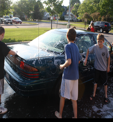 Kids washing a car