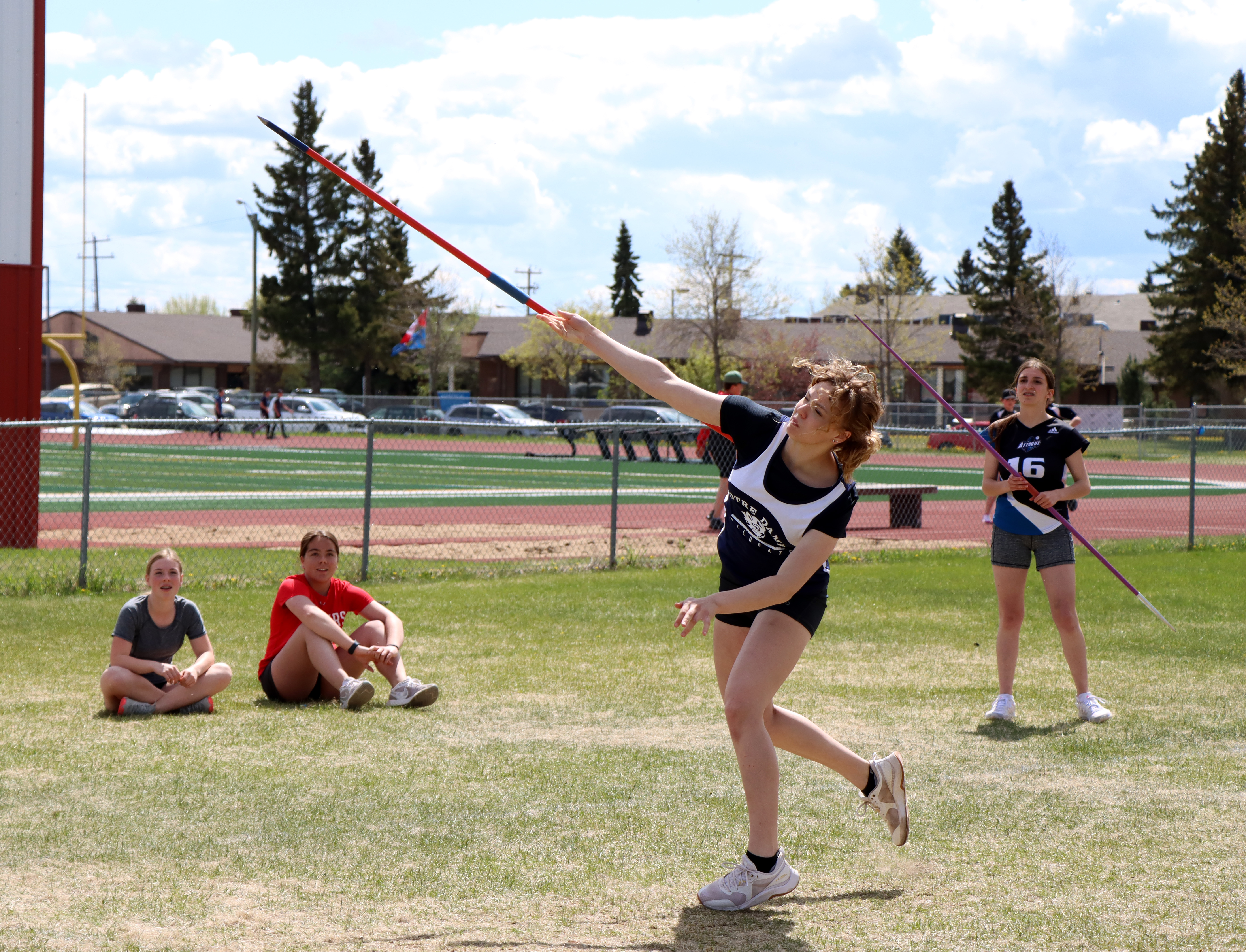 Student throwing javelin 