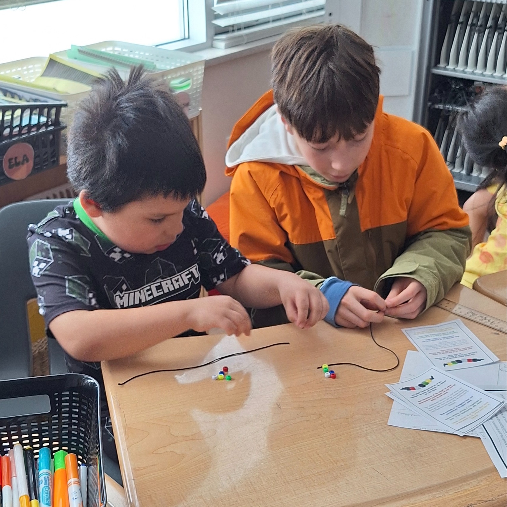 students playing in snow