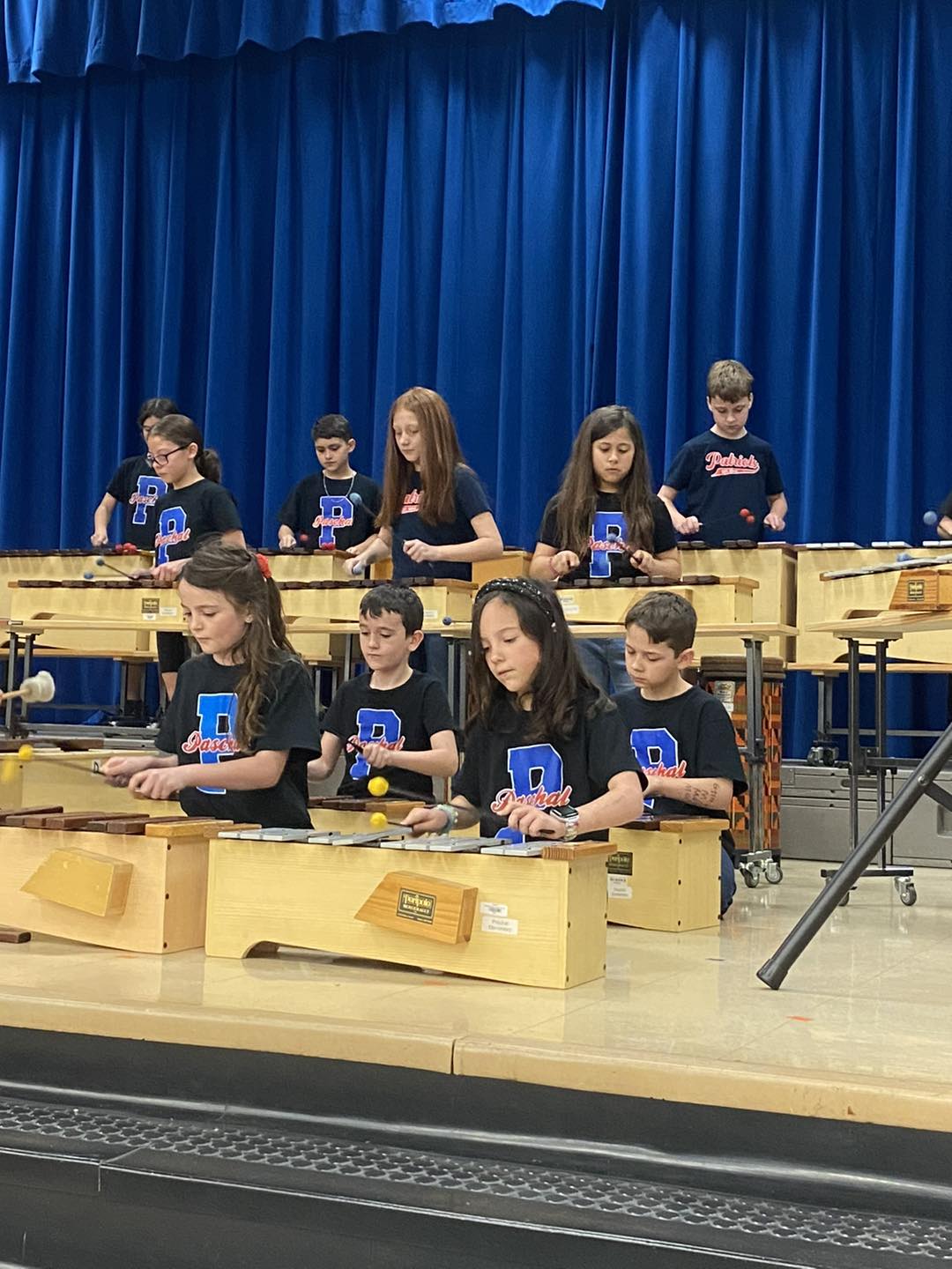 kids playing xylophones