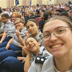 group of JROTC students seated in an auditorium