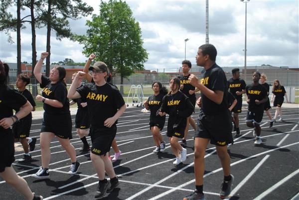 students running around the track