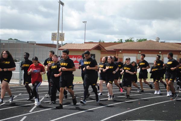 students running around the track