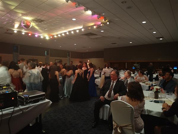 a large group on the dance floor