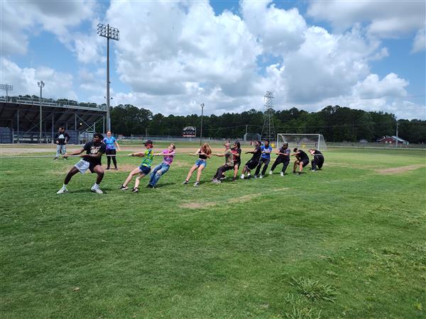 students playing tug o' war