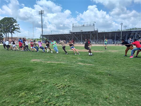 students playing tug o' war