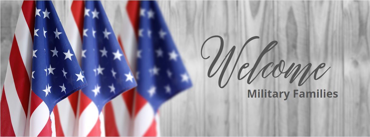 Three American flags "Welsome Military Families"