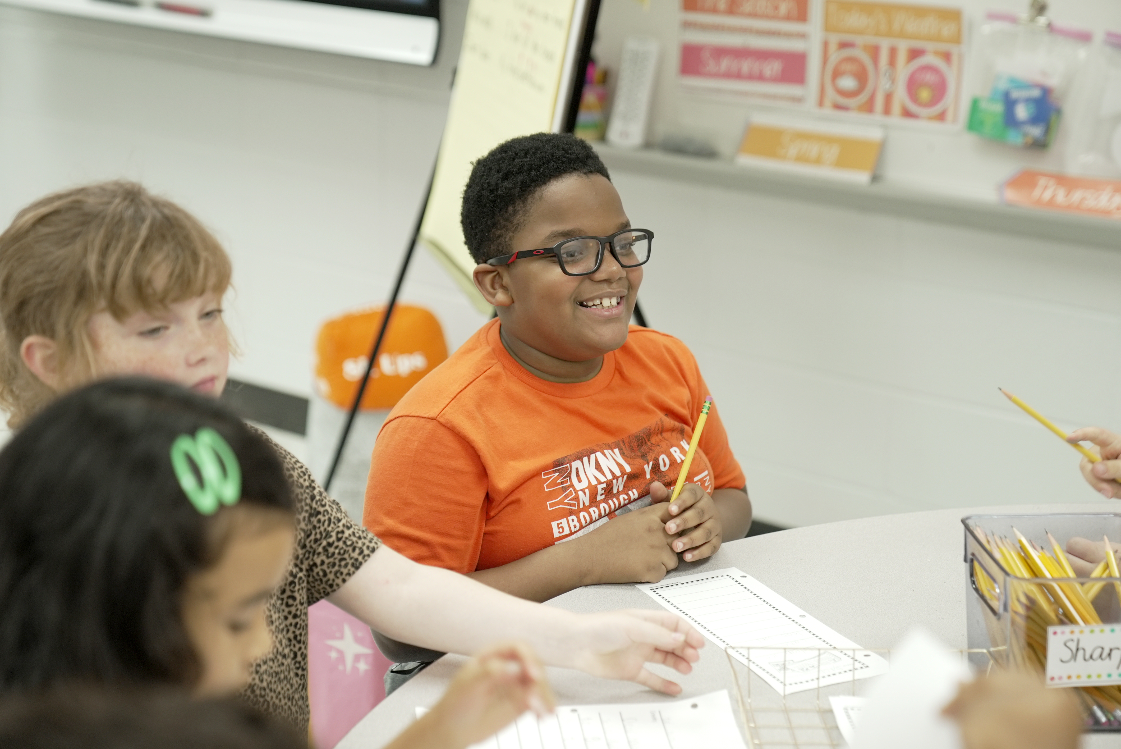 student WVE smiling during class