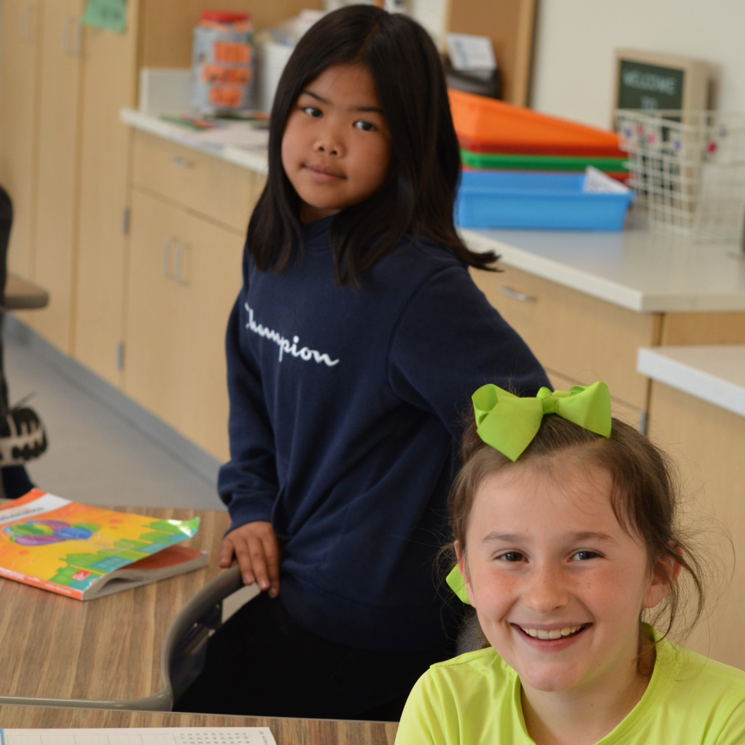 Students smiling at camera