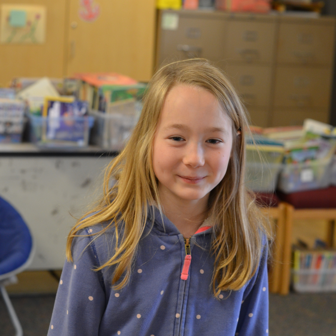 Student smiling at camera