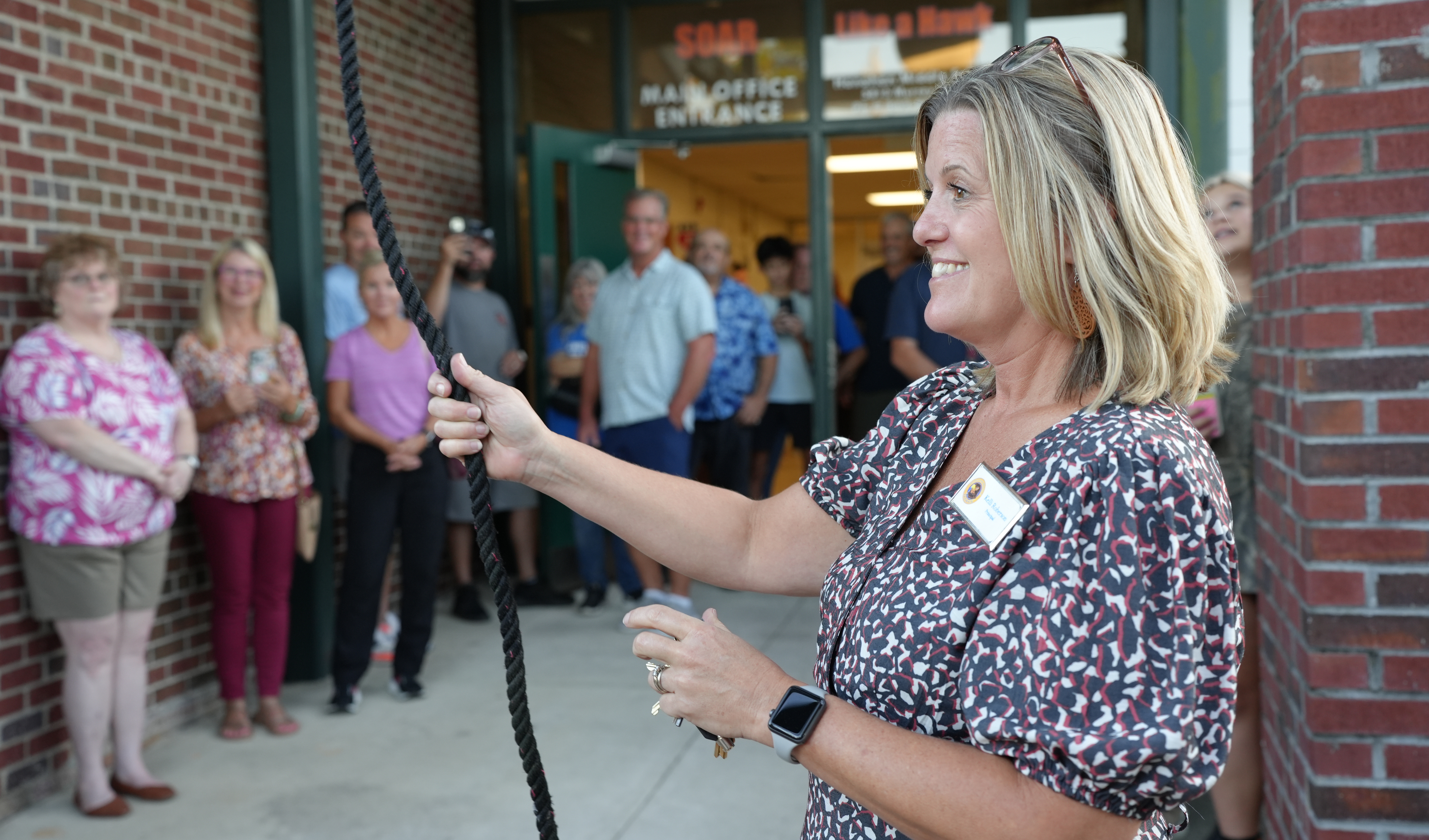 Kelli Roberson ringing the bell