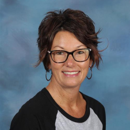 Beth Otto - Polenta Elementary Assistant Principal Headshot on blue background
