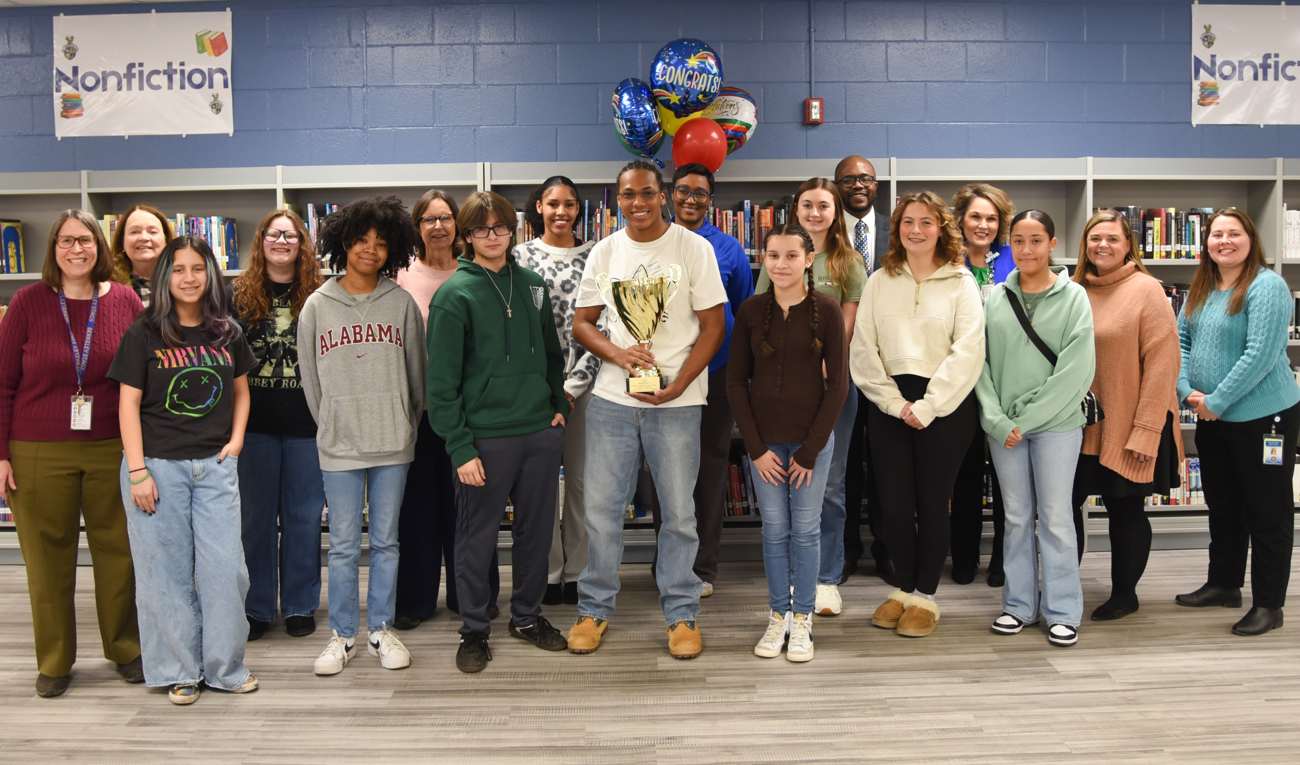Berkeley High students and staff with district leadership receiving Berkeley Book Blast trophy