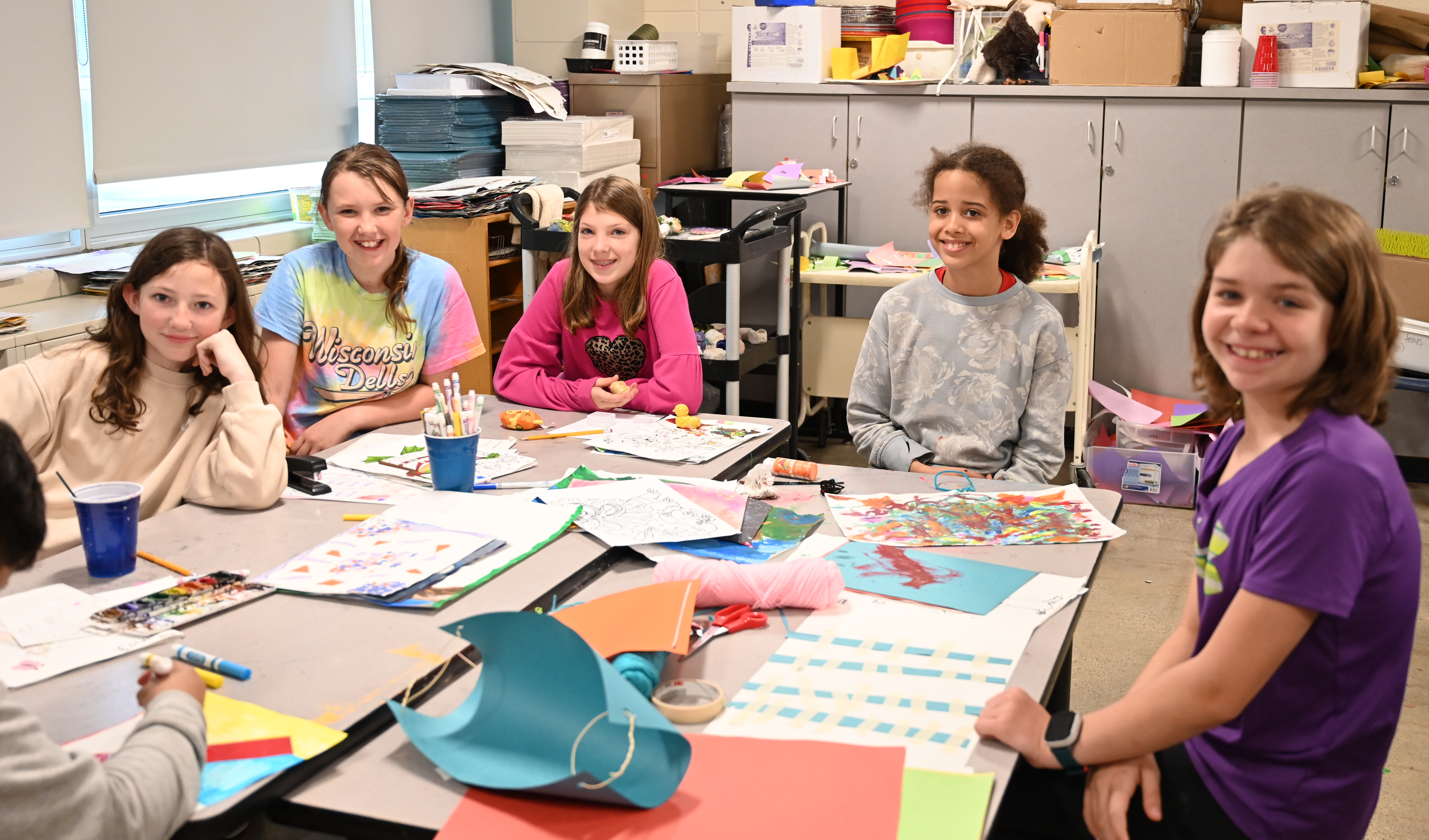 Children of Elton Hills engaged in hands-on learning