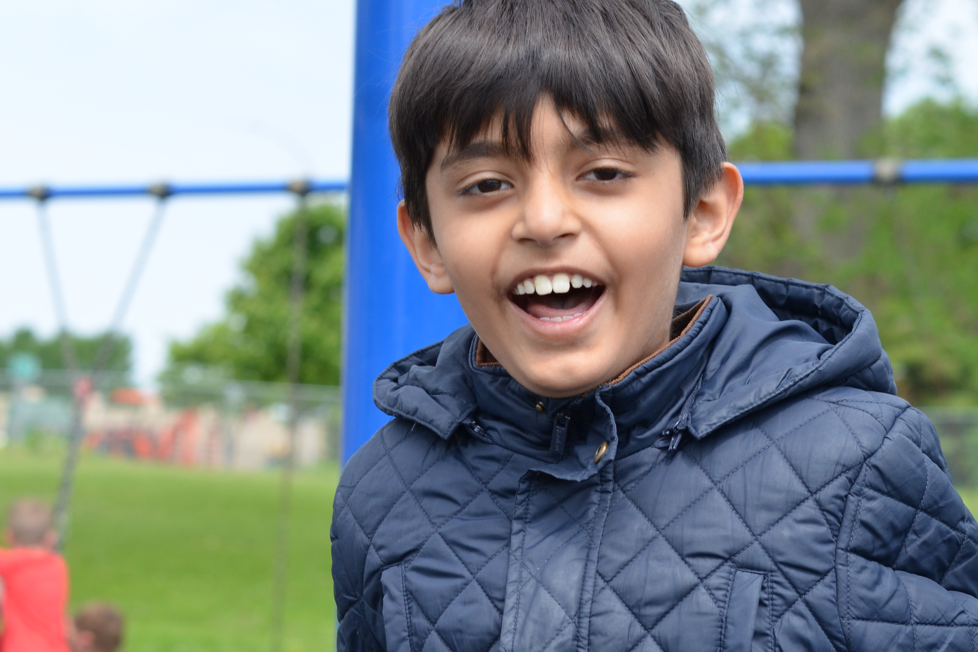 Student smiling at camera