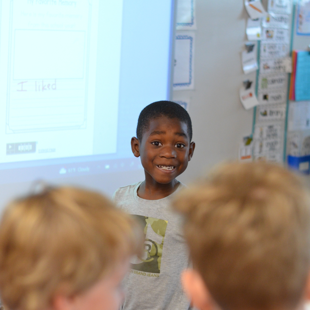 student smiling at camera