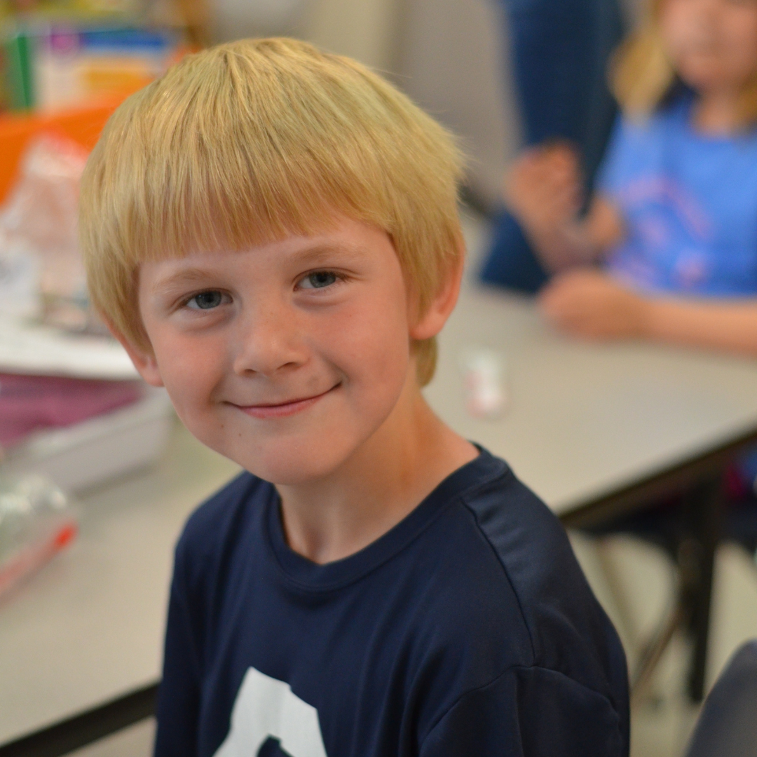 student smiling at camera