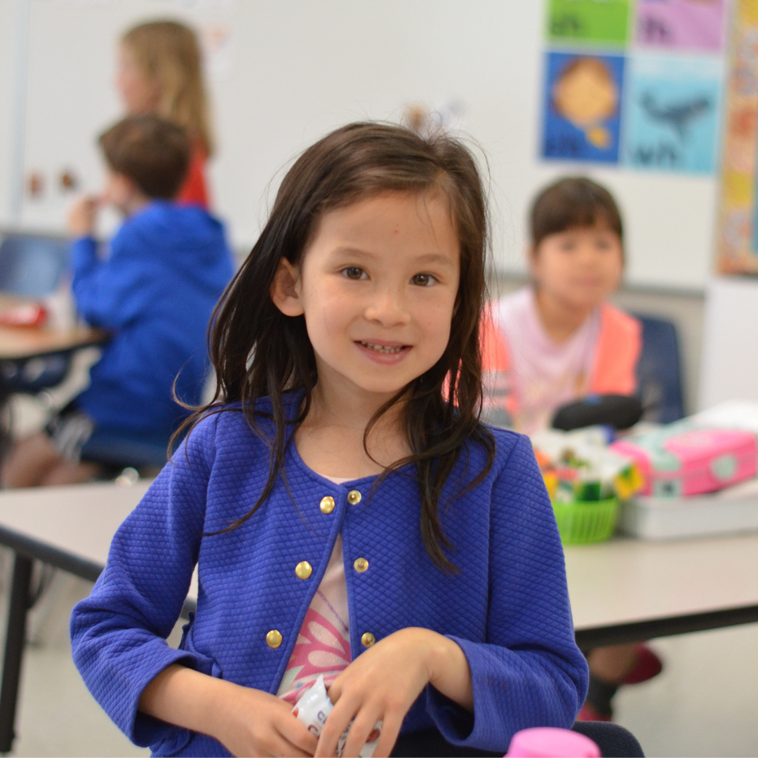 Student smiling at camera