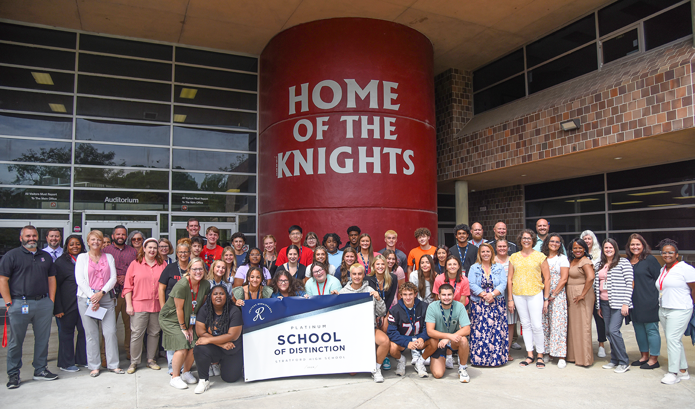 SHS with Jostens School of Distinction banner