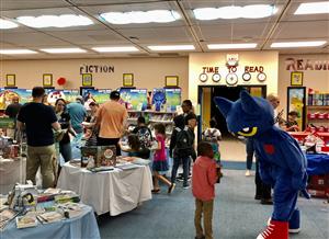 Students and Mascot in the Library