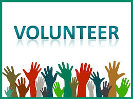 volunteer with raised hands