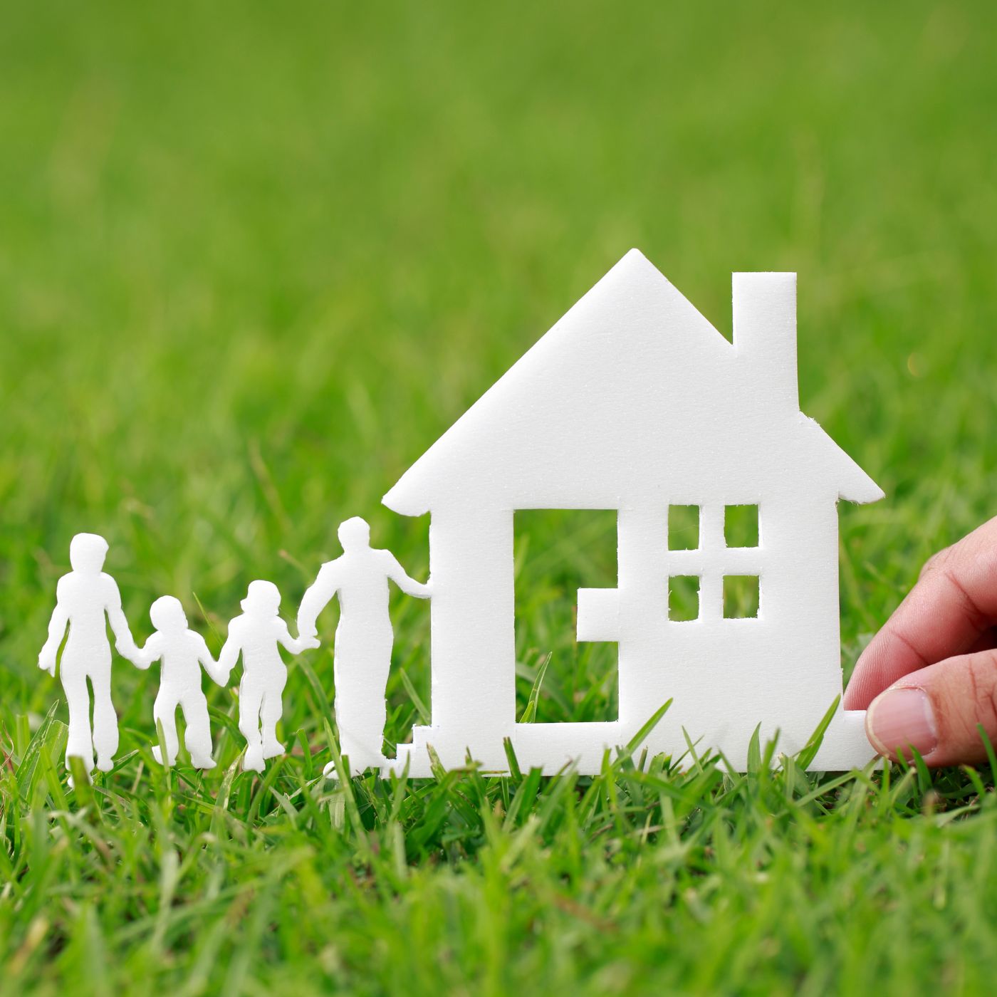 Cutout of a house and family