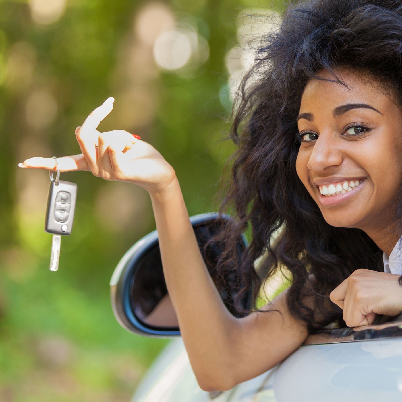 Teen holding car keys