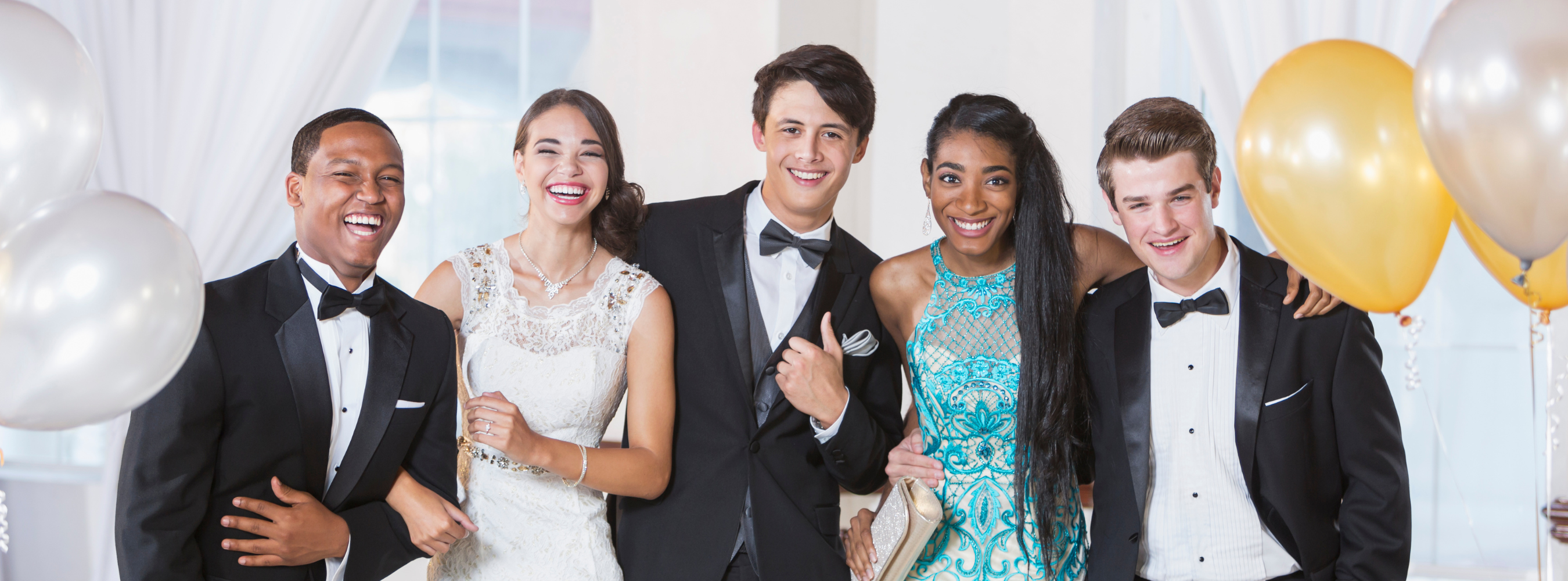 Diverse students in prom attire