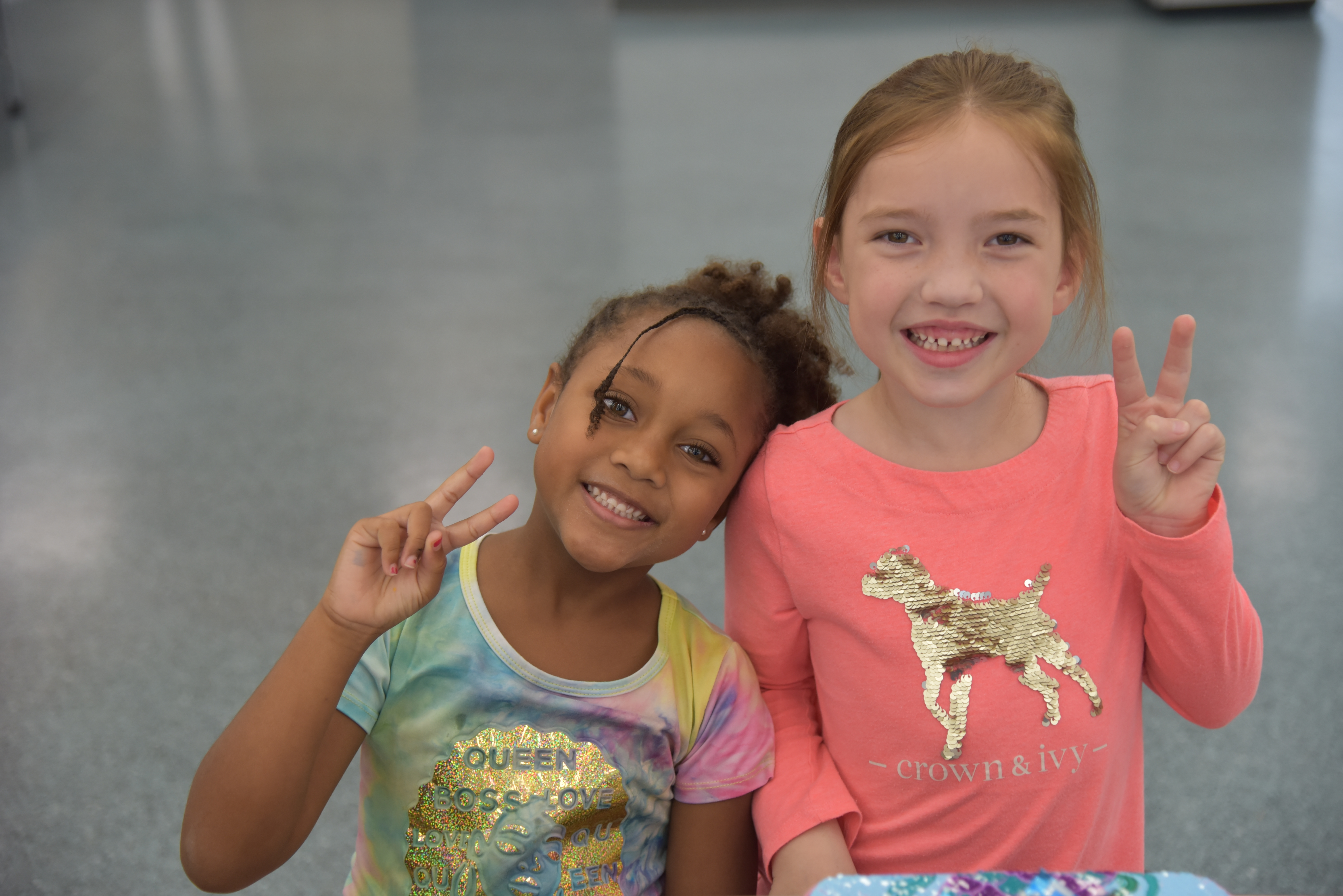 kids smiling at the camera