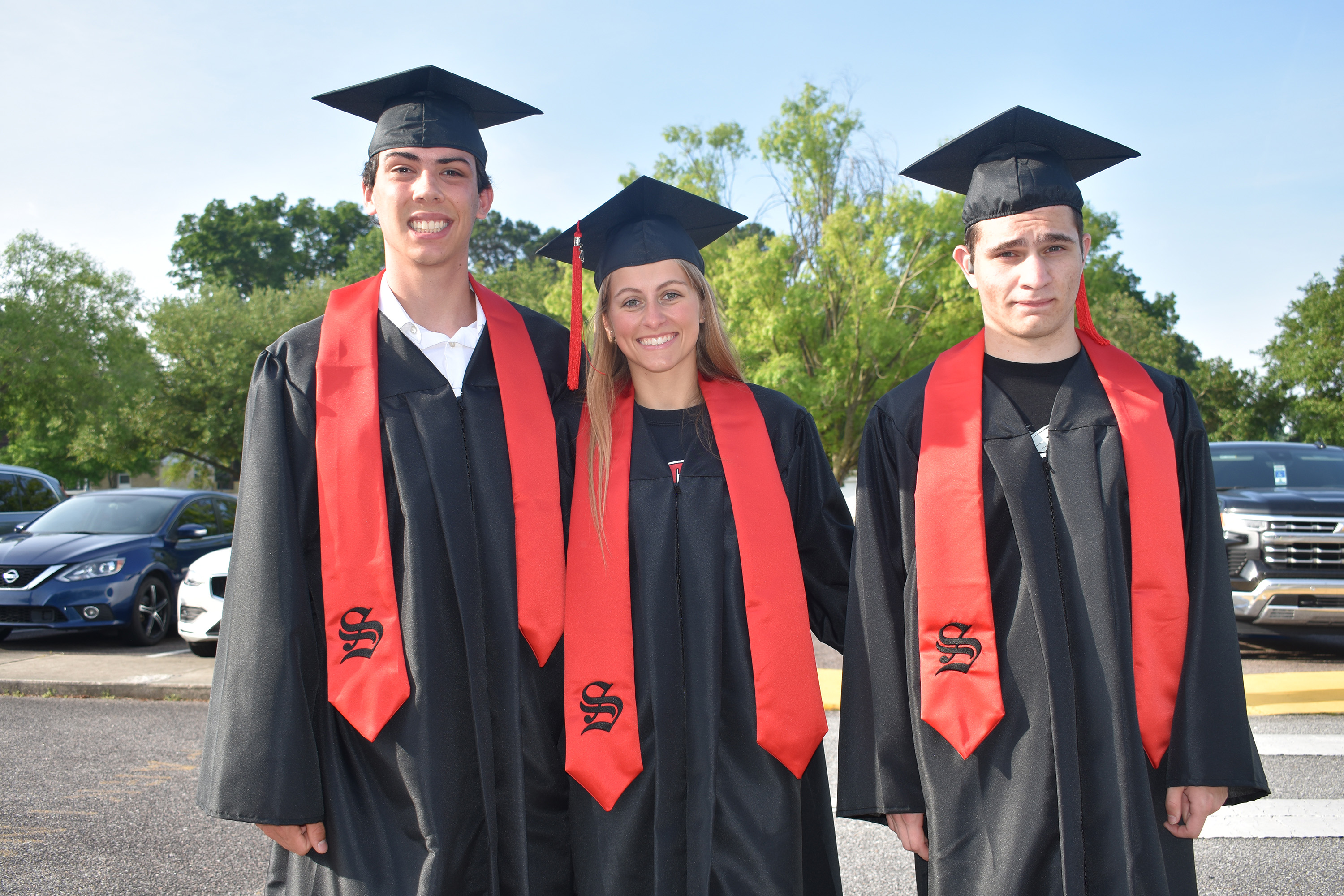 three SHS graduates