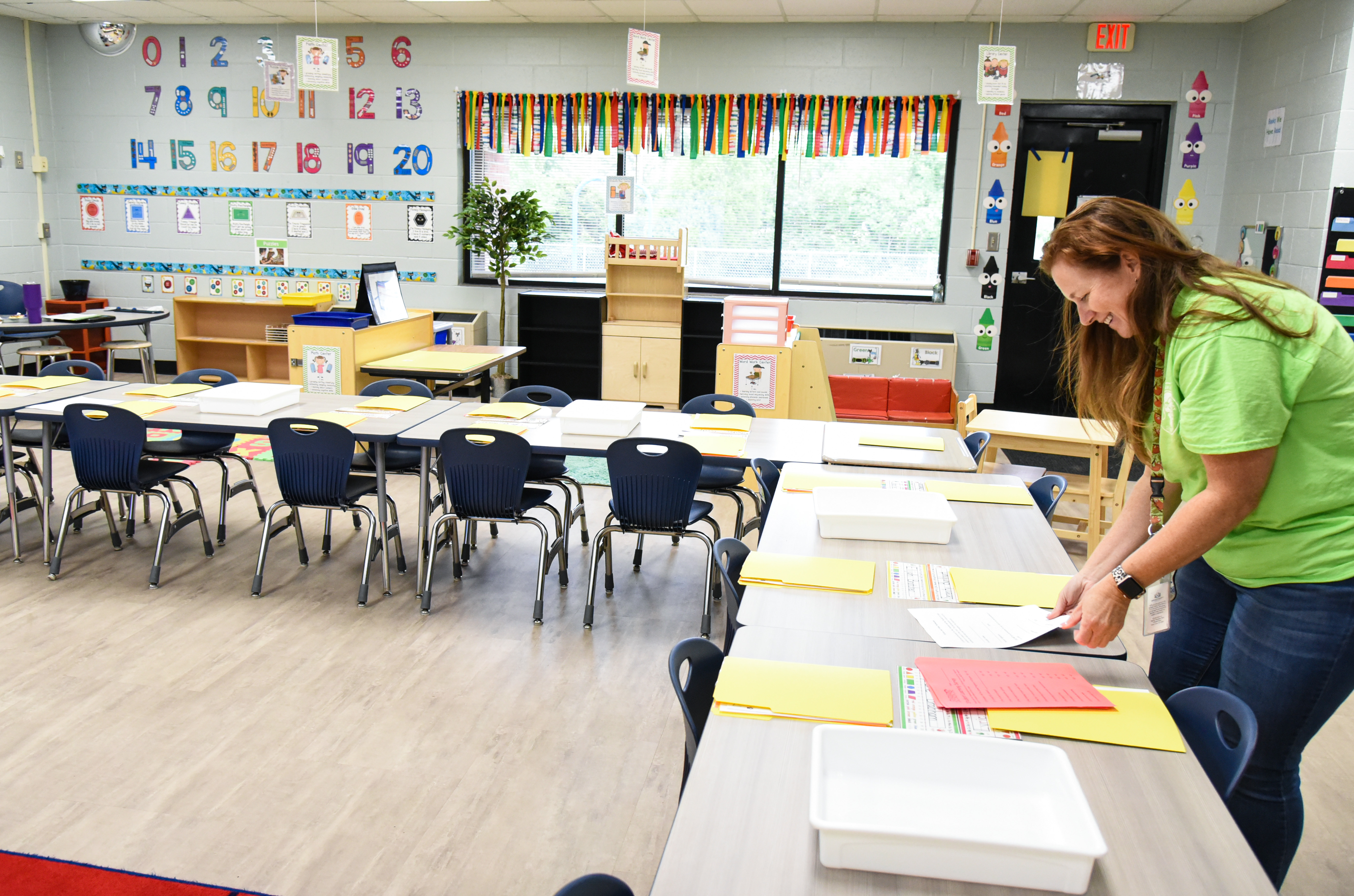 teacher setting up classroom