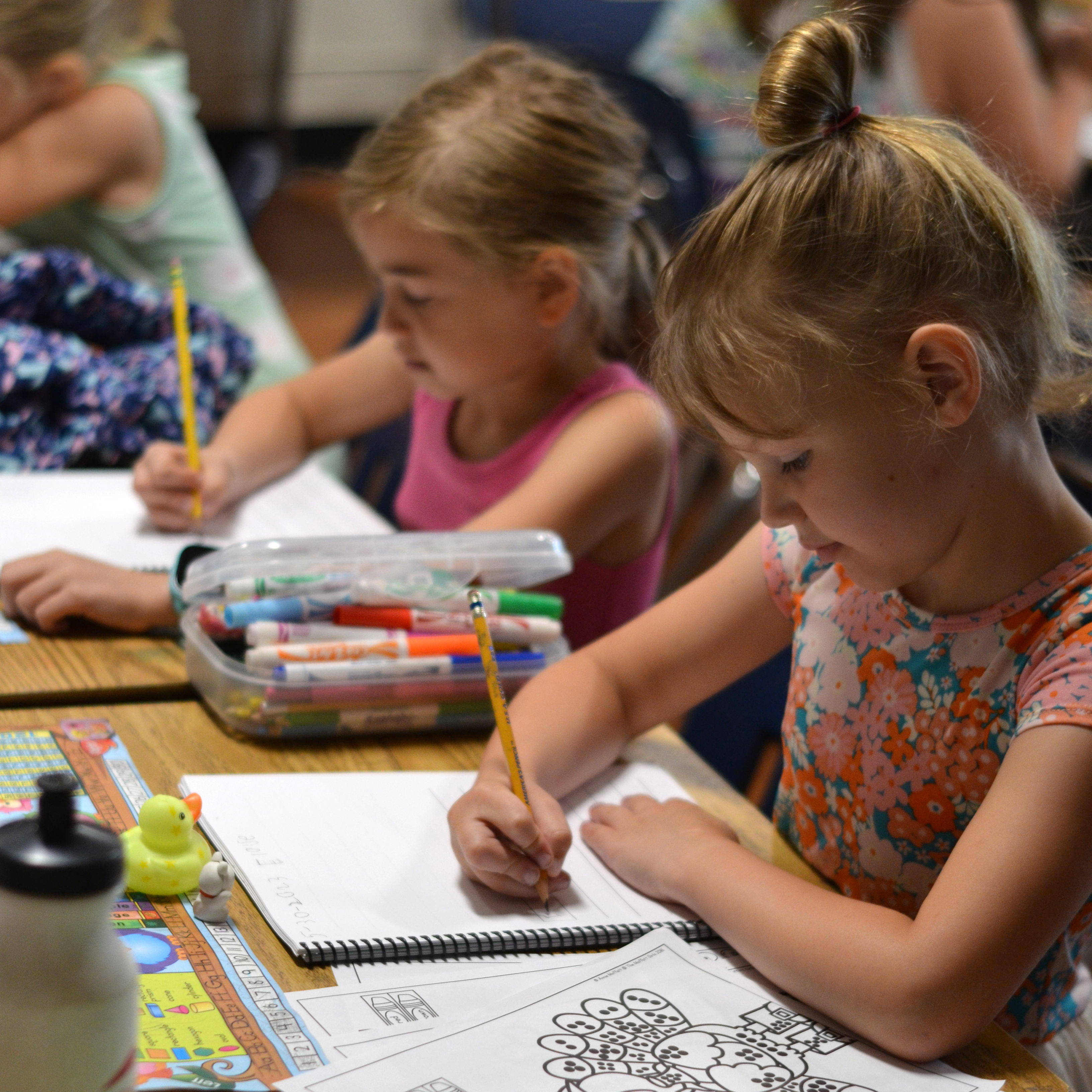 Students working on their assignments at their desks