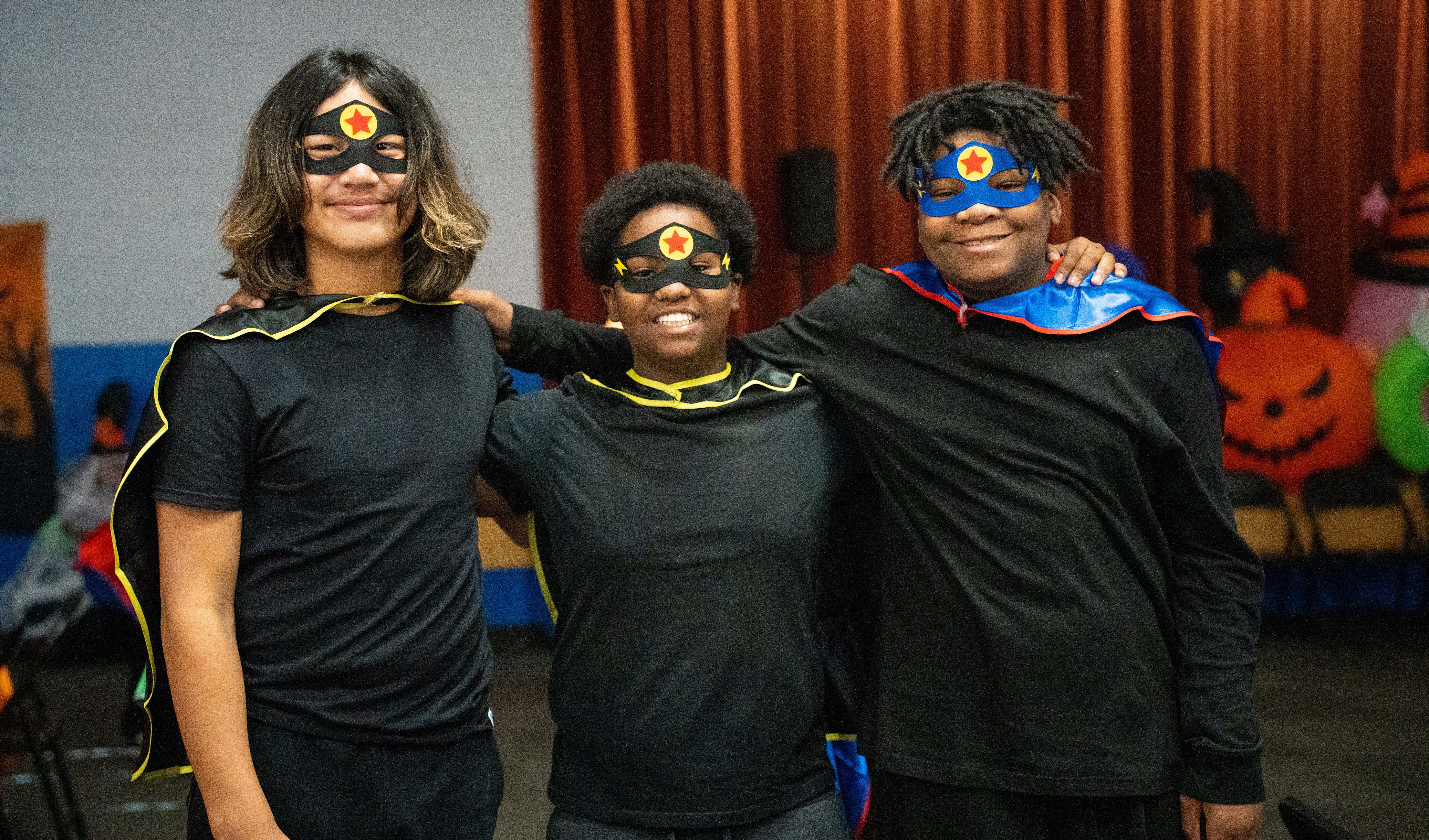 SRM dressed as superheroes